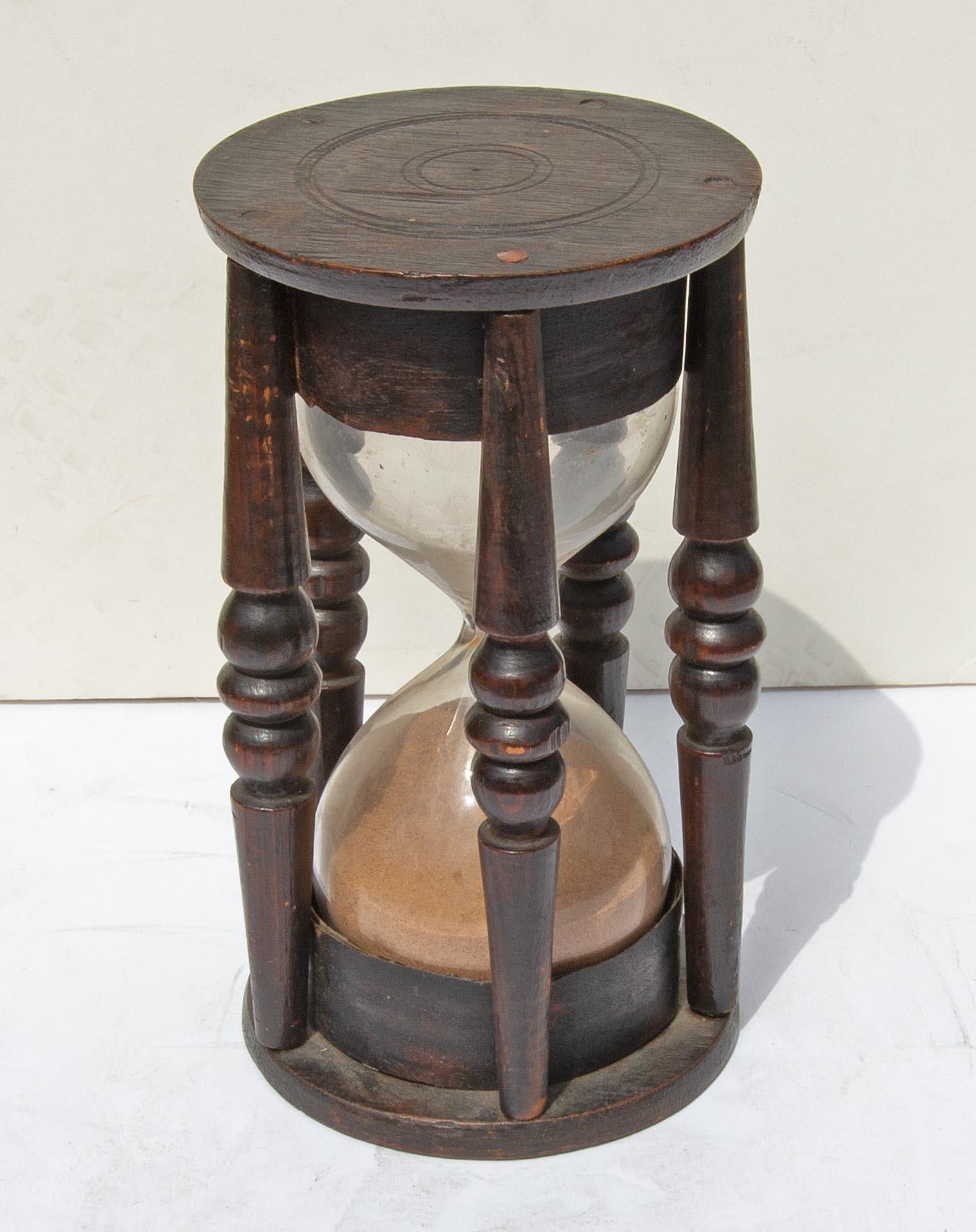 Early 19th century hourglass. Continental. Blown glass. Oak and pine.