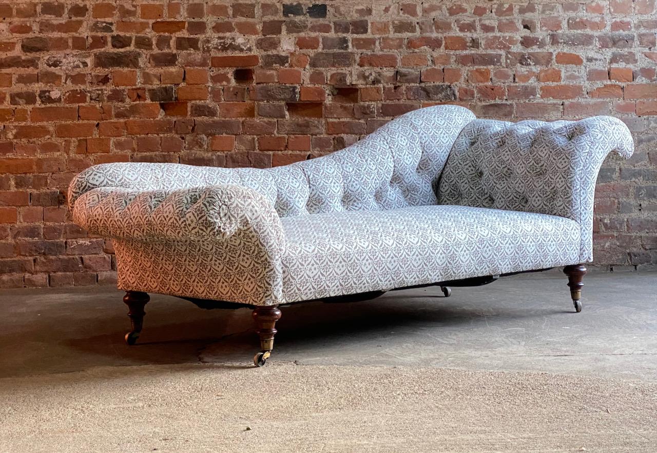 Antique Howard and Sons chaise lounge 19th century, circa 1870

Exceptional antique Victorian era Howard and Sons Walnut chaise lounge 19th century circa 1870, upholstered in soft grey Howard and Sons ticking material, the shaped and button tufted