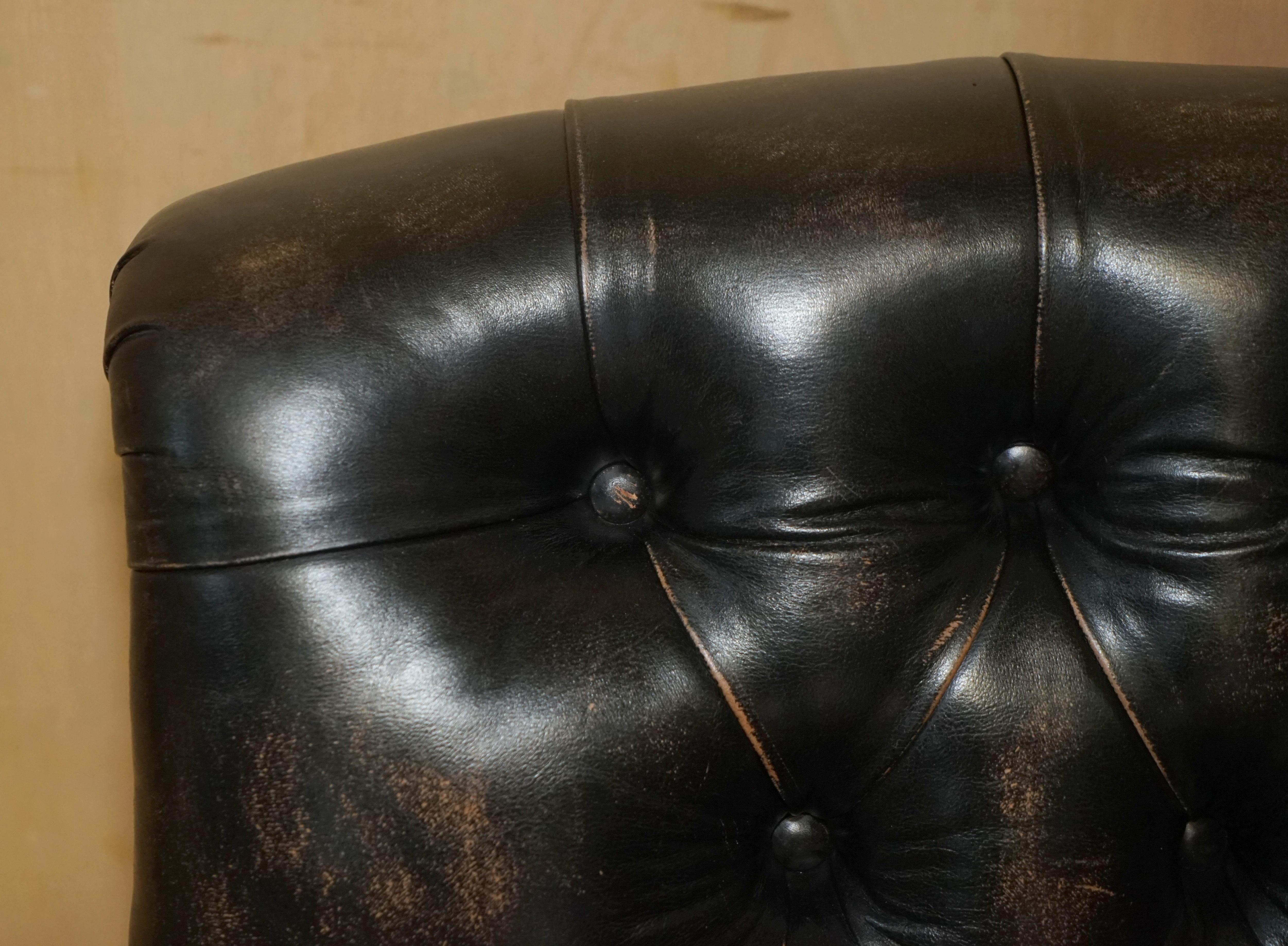 Hand-Crafted Antique Howard & Son's Bridgewater Style Black Leather Chesterfield Armchair For Sale