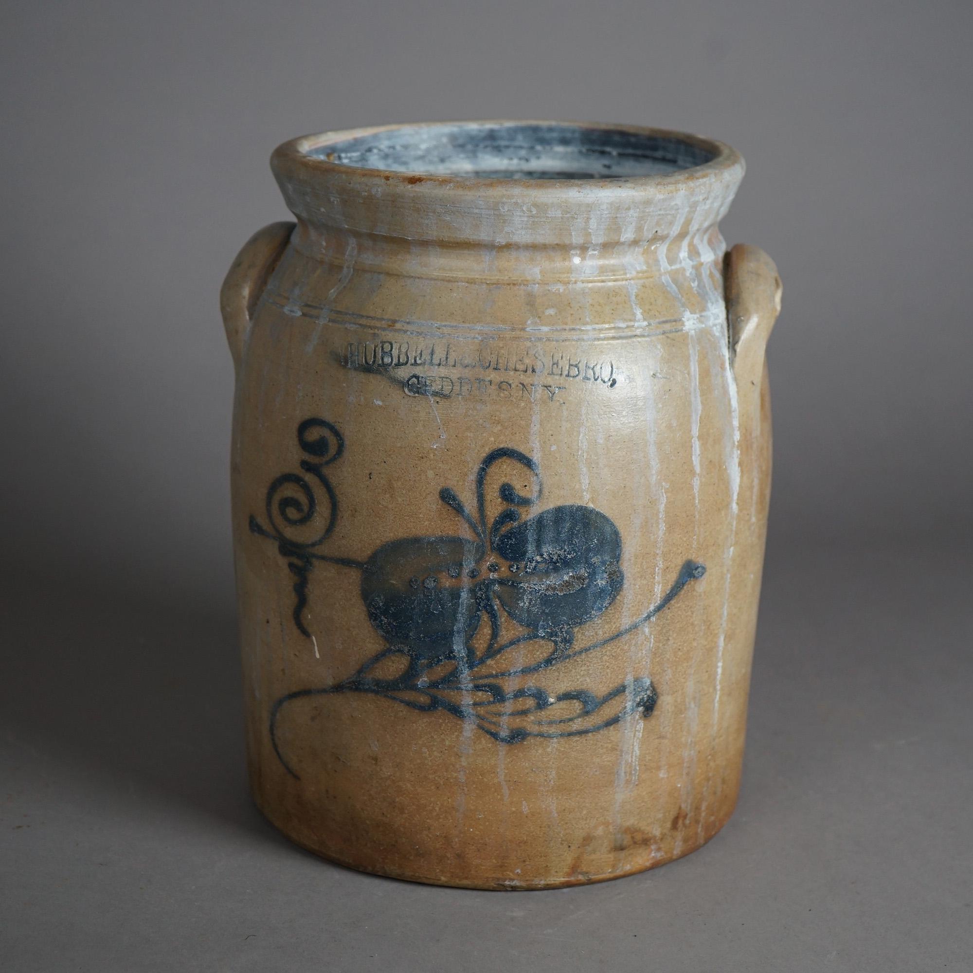 An antique stoneware salt glazed crock by Hubble And Chesebro offers blue decorated floral design, double handles and maker stamp as photographed, c1880

Measures- 12.25''H x 10''W x 10''D