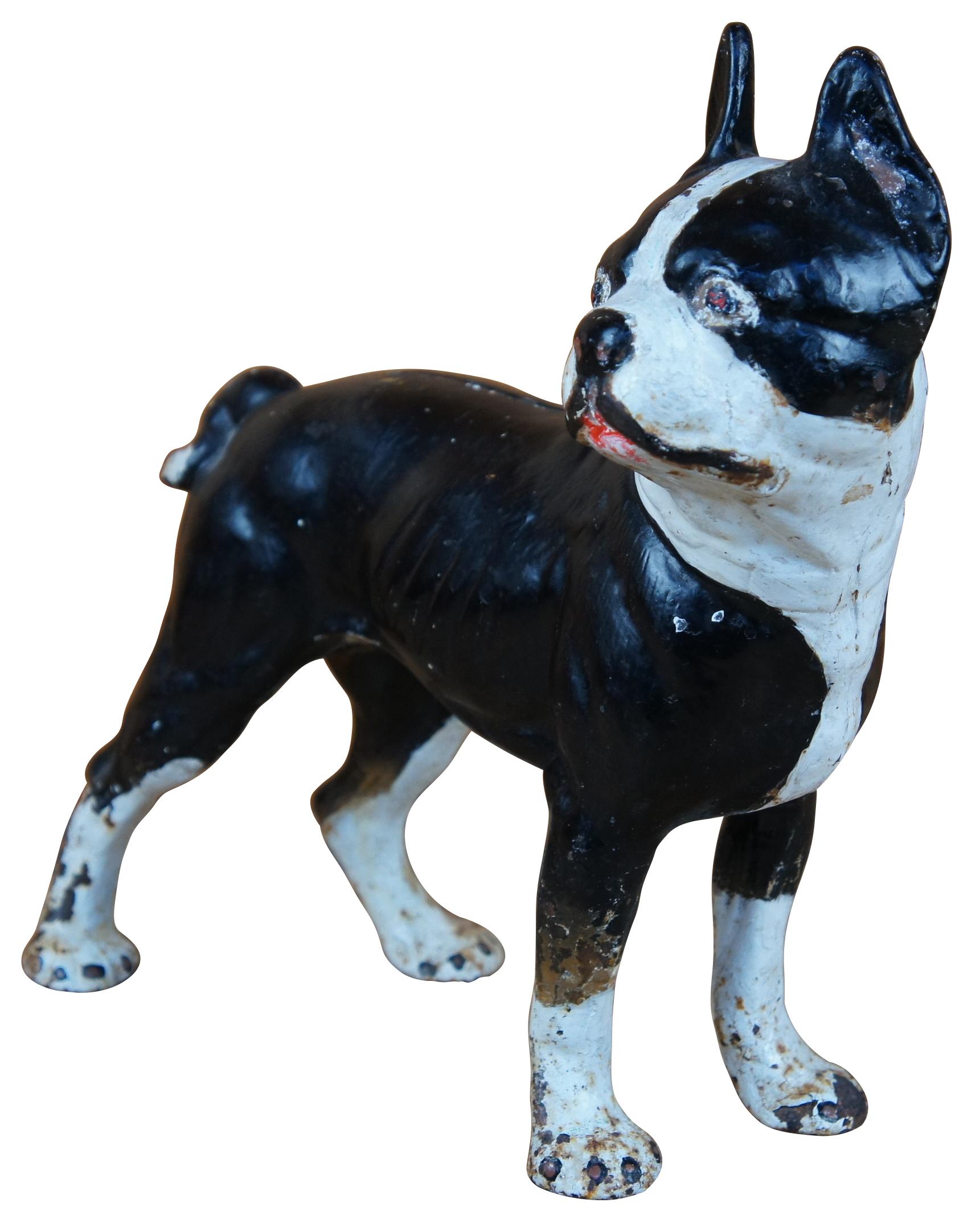 Cast iron dog made of to adjoining pieces possibly made by Hubley, good for use as a door stop or bookend. Size:10