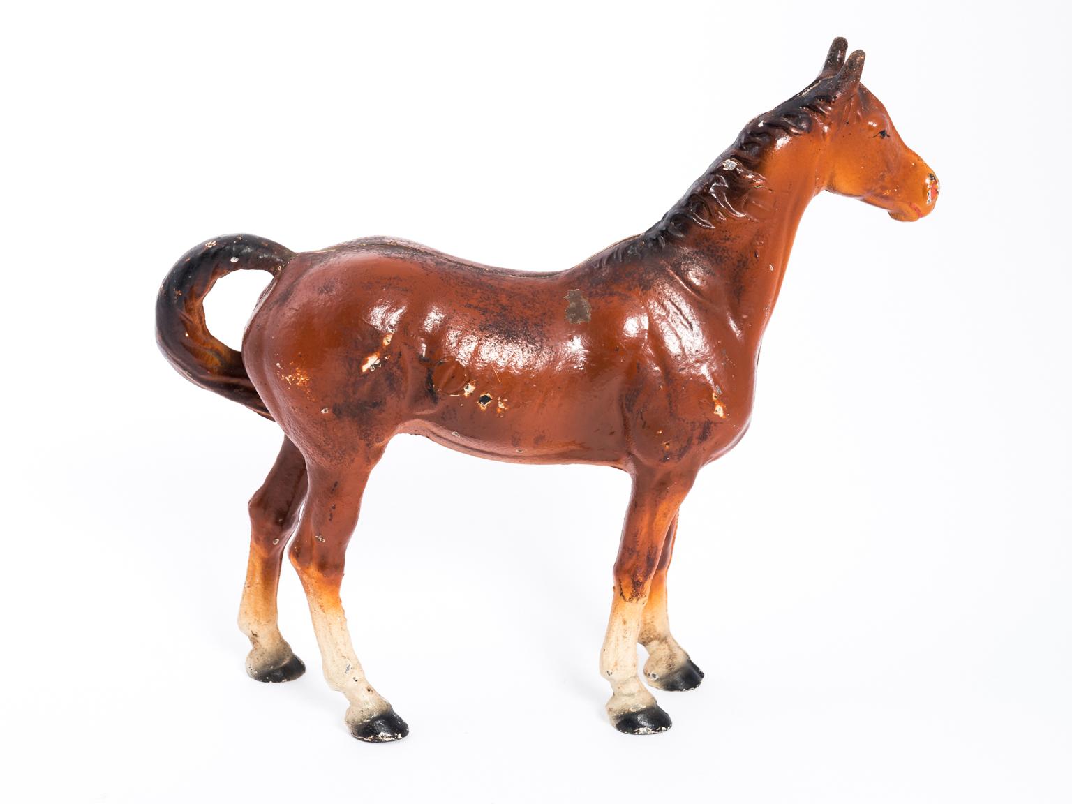 All original Hubley thoroughbred cast iron horse. It has original paint with mild wear and chipping. No breaks, cracks, or repairs to cast iron. Some slight oxidation to tips of ears. No touch ups or repaint. Horse retains the majority of its