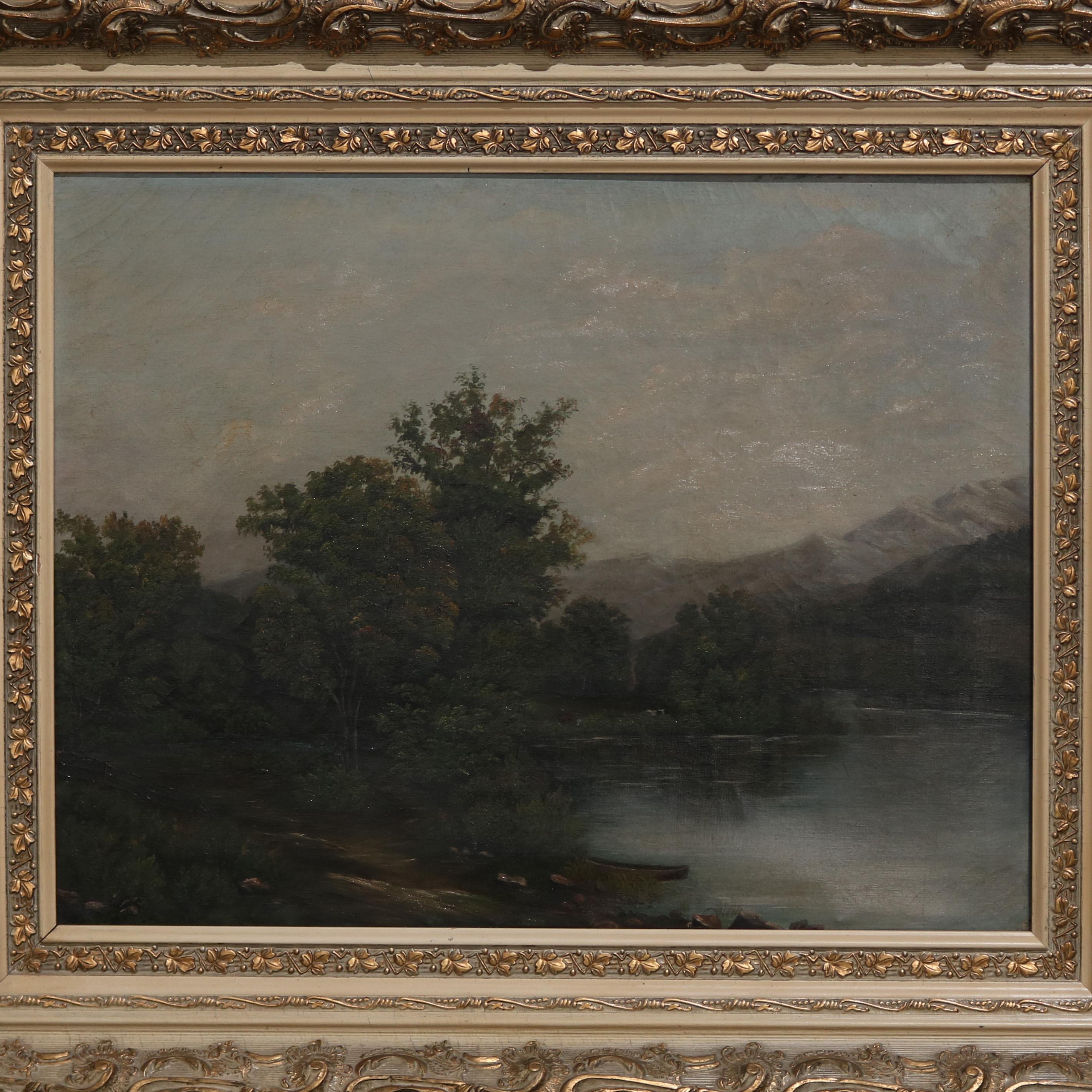 An antique Hudson River School oil on canvas landscape painting depicts wooded setting on river with mountainous background, seated in gilt and painted foliate and scroll decorated frame, 19th century. 

Measures: 27