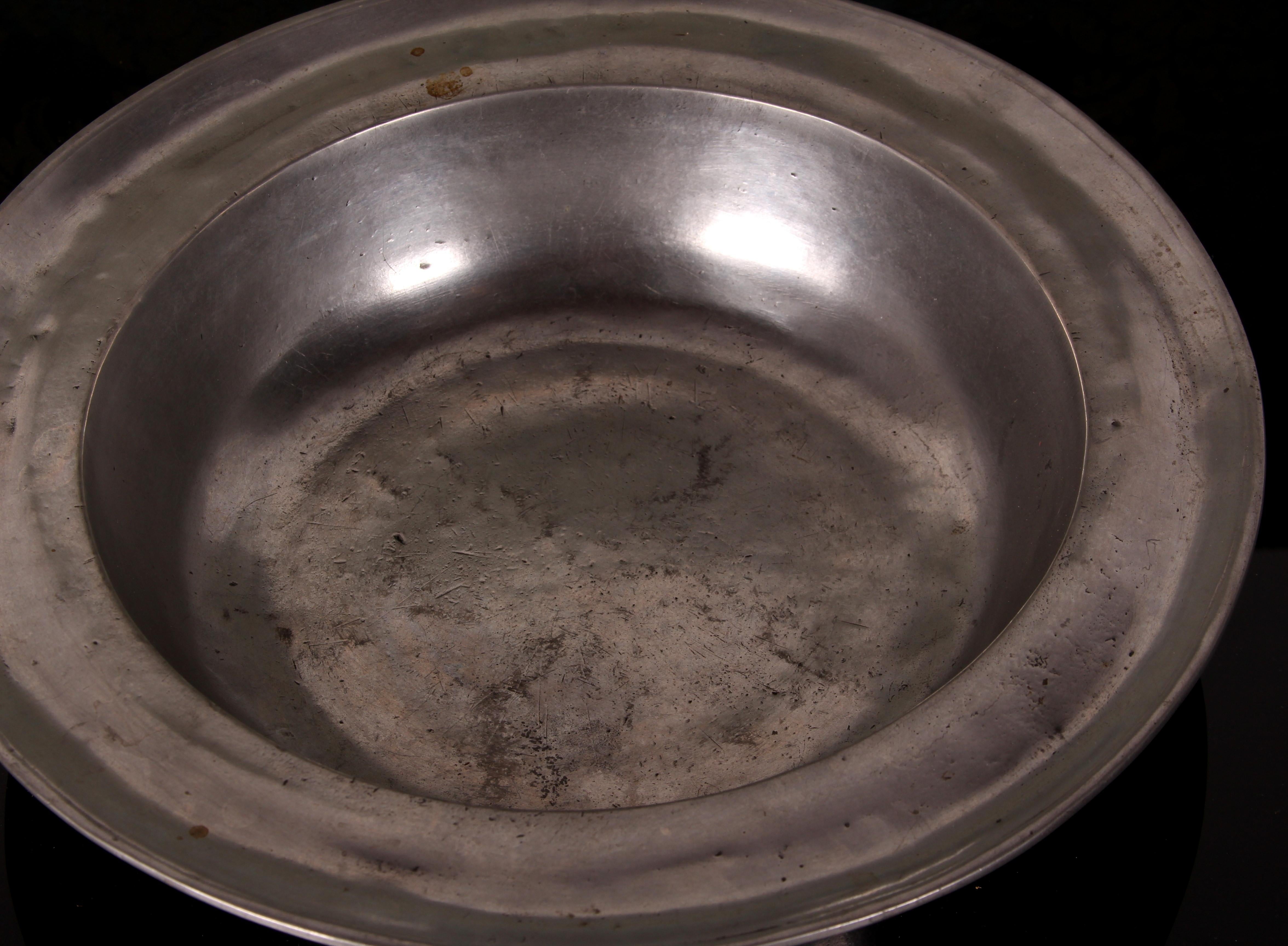A huge pewter bowl 
Manufactured most probably in Alsace  
Production Period 	around 1780
Country of Manufacture Germany
 H / height: 5.5cm ~  Gew. / weight: 1391 grs 
DM  / diameter  : 30 cm ~ DM innen / diameter inner : 21.5cm 
MARKED: hallmarked