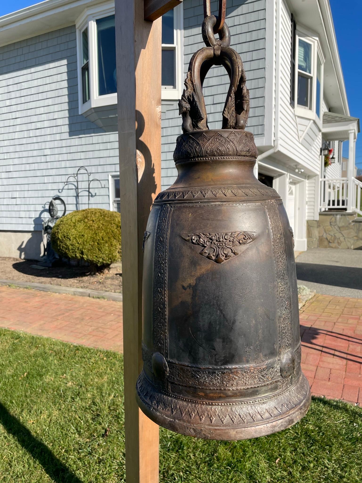 Only One.

For Your Garden setting or Indoors

Beautiful deep resonating ring tones await the new owner of this one-of-a-kind master bronze work.

This superb antique hand cast bronze temple bell dates to the early 20th century. 

Dimensions:
Bronze