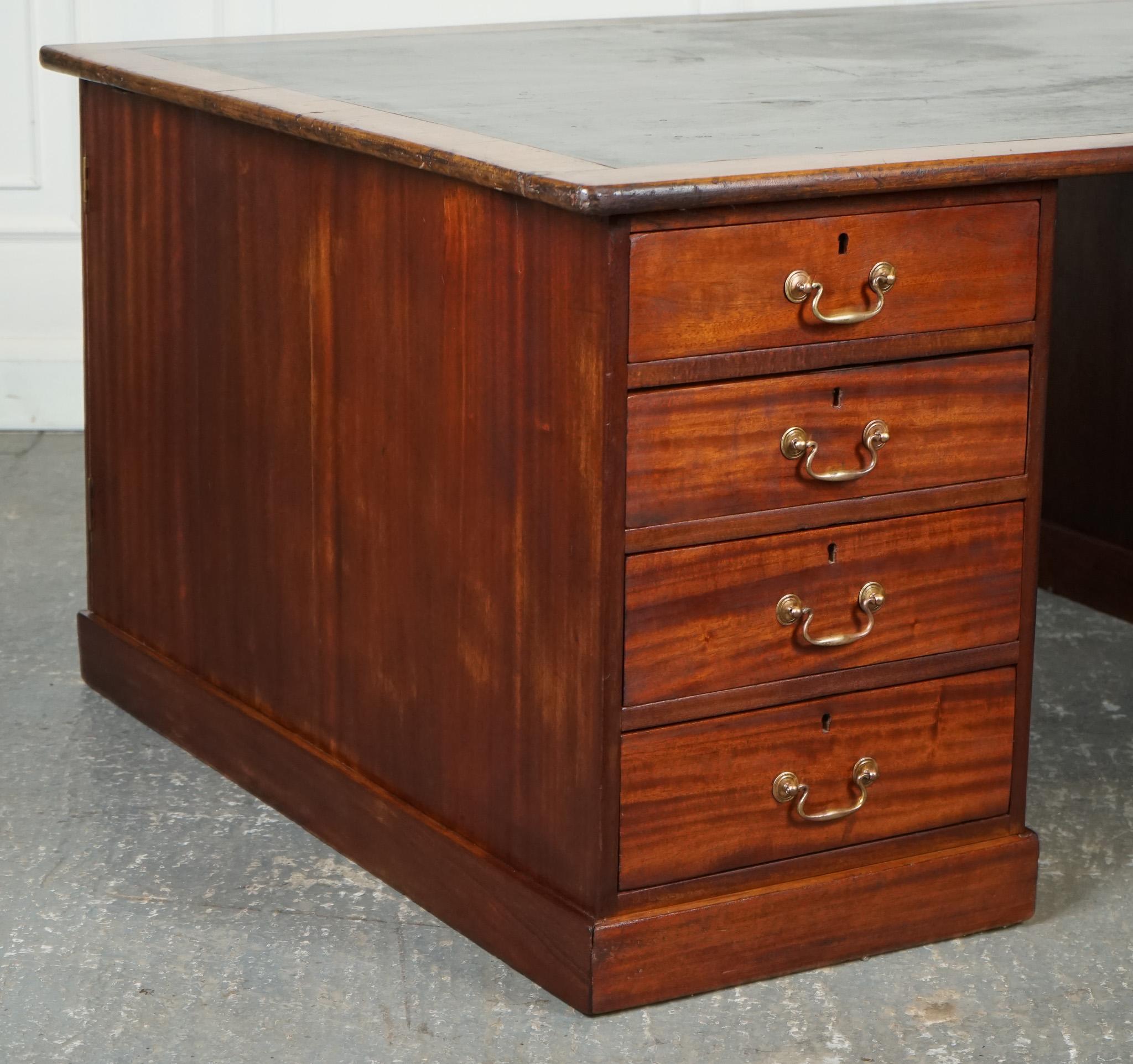 

We are delighted to offer for sale this Huge Partners Desk With Navy Blue Desk.

An antique huge distressed partners desk with a navy blue leather top is a magnificent and imposing piece of furniture that exudes character and vintage charm.

The