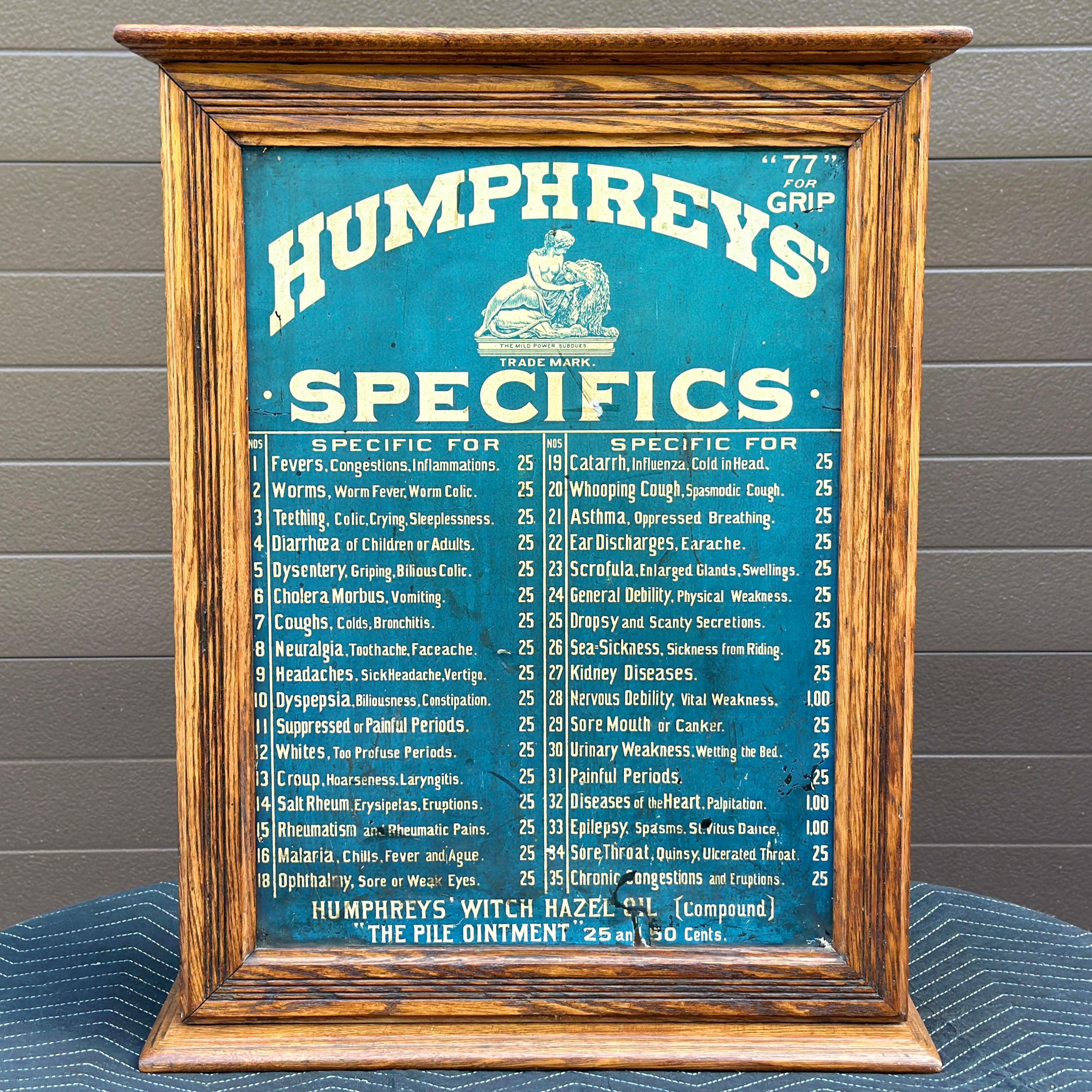 Antique Humphreys’ Specifics Apothecary Medicine Cabinet circa 1900. Double sided advertising opening on one side to reveal
interior with thirty four original drawers - thirty small drawers with interior space measuring approximately 3.1” wide x