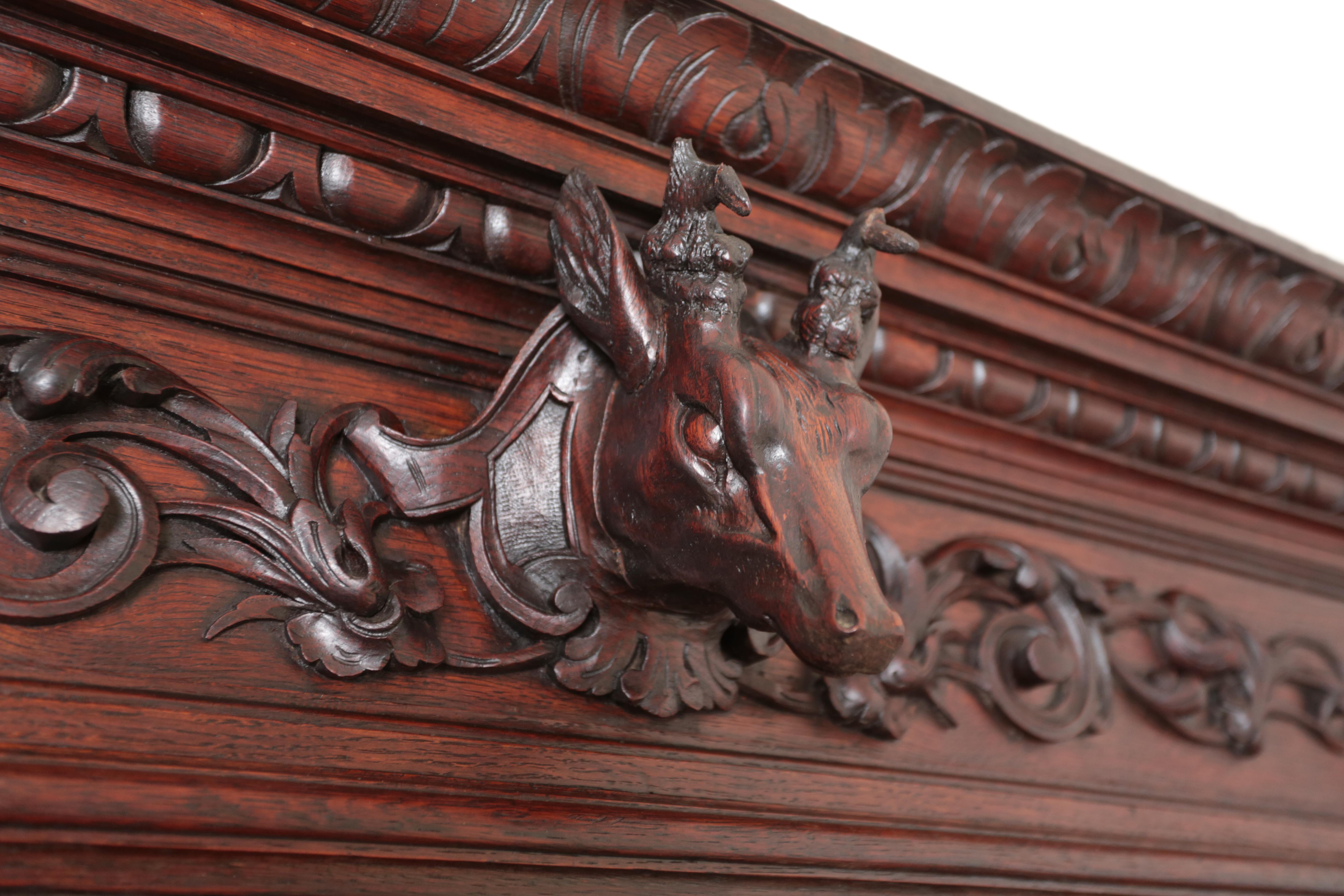 Hand-Carved Antique hunting sideboard / bookcase For Sale