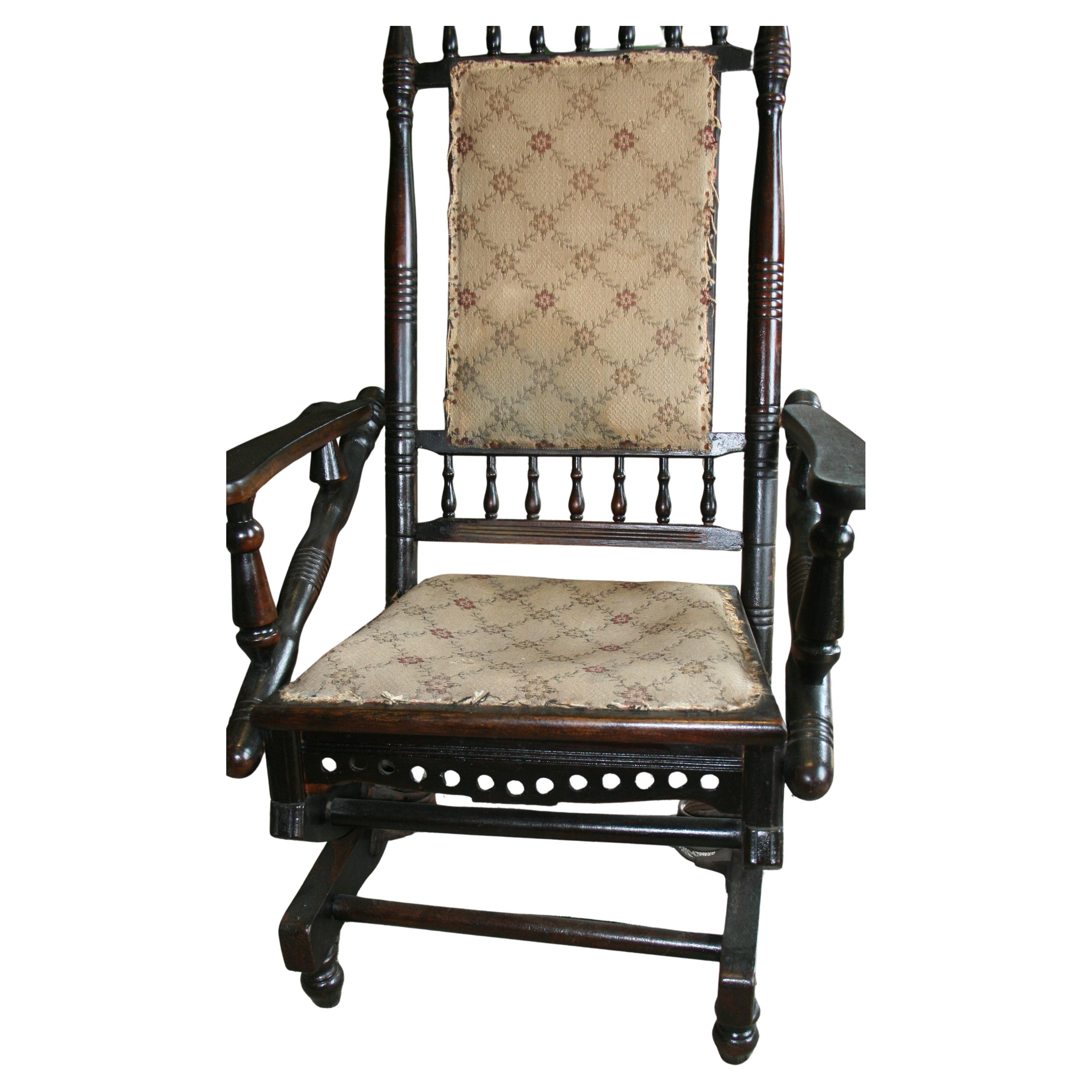 Antique Hunzinger hardwood rocking chair
original fabric
Rocking metal  mechanism work well