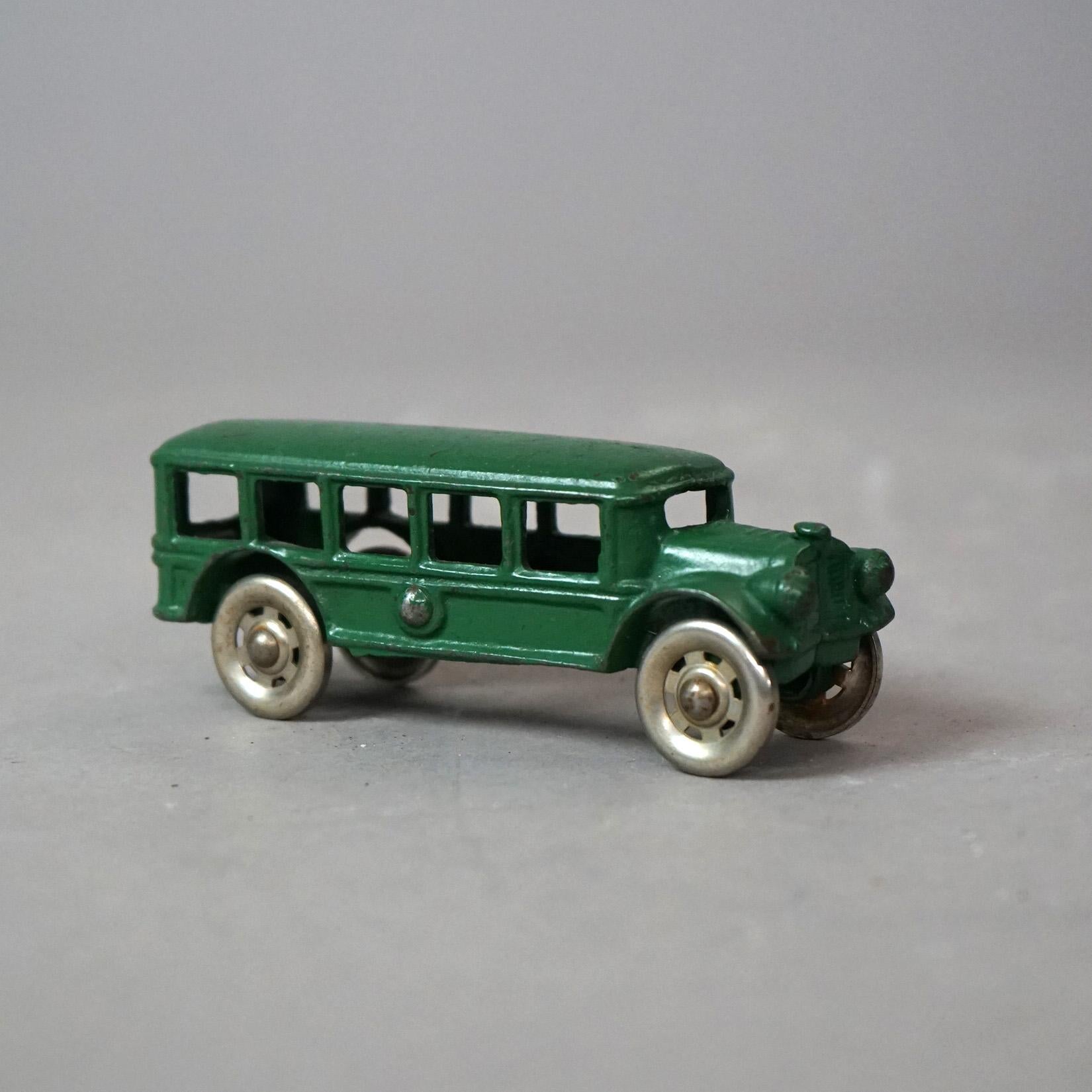 Antique Hurley Green Painted Cast Iron Toy Bus Circa 1930

Measures- 2''H x 2''W x 5''D