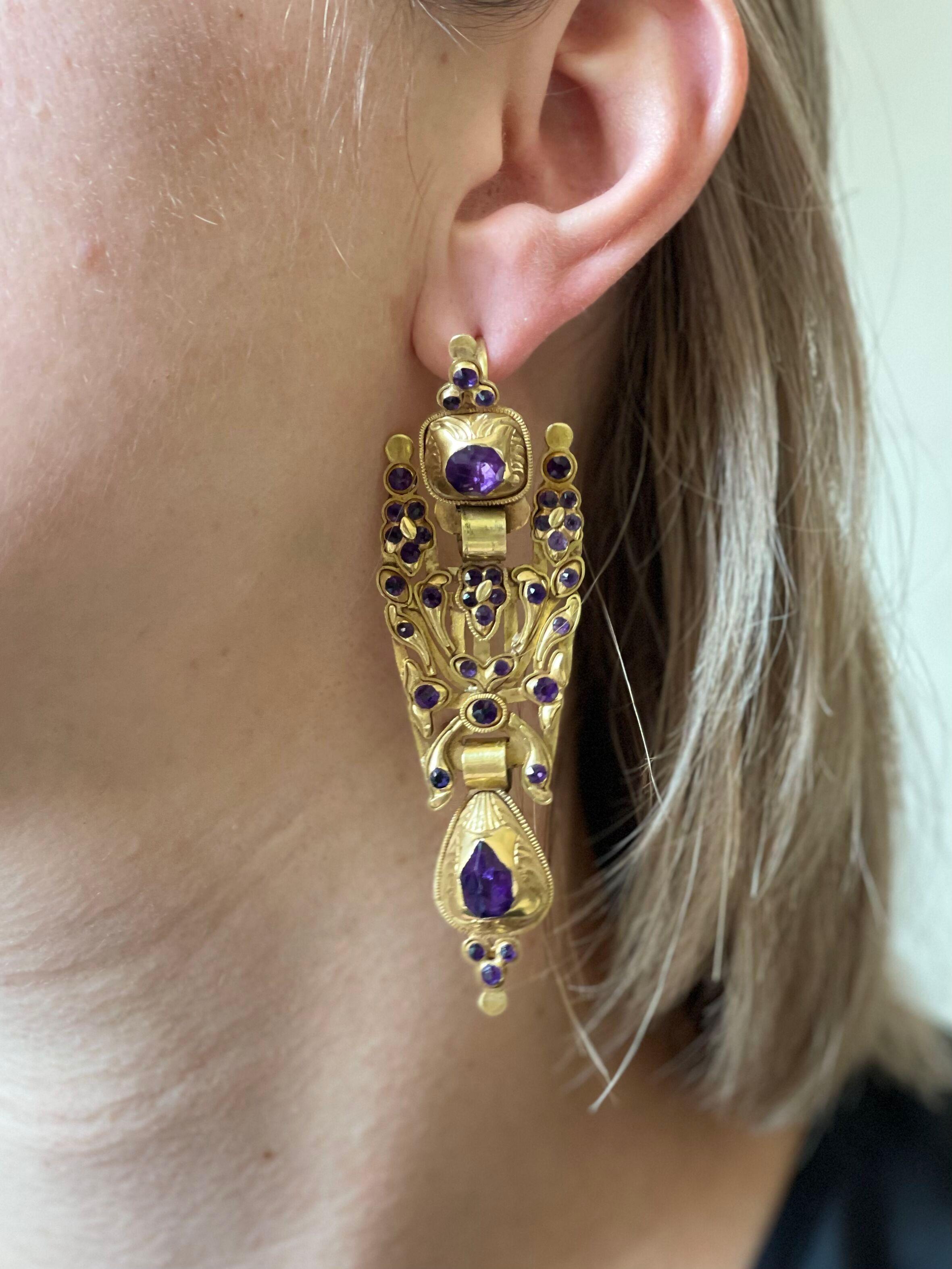 Pair of antique Iberian 14k gold earrings, set with amethyst gemstones. Earrings are 3 5/8