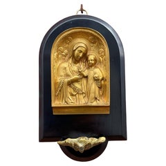 Antique Icon like Gilt Bronze Mary and Child Jesus Plaque over a Holy Water Font