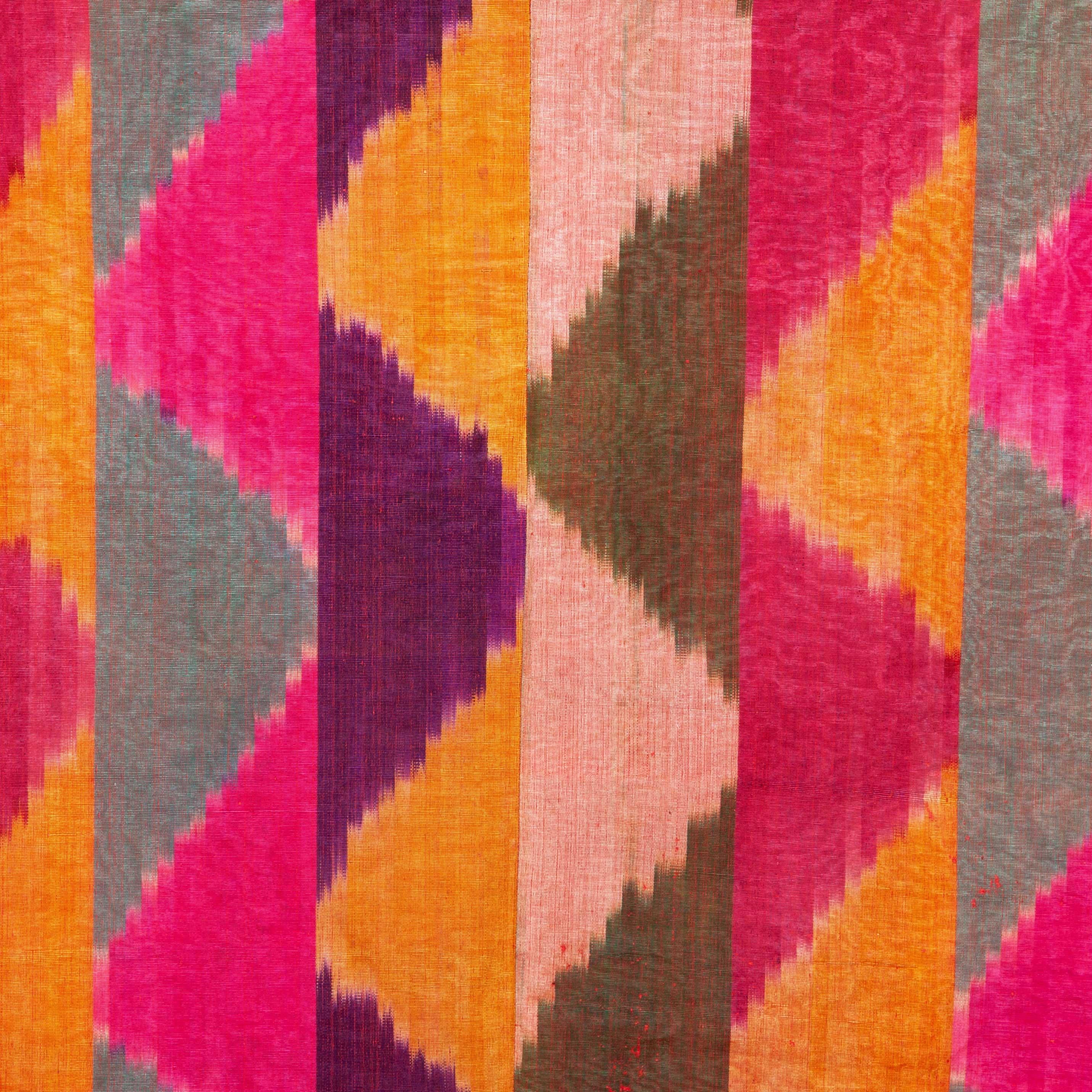 This ikat displays a blast of color with a modern design and dates back to the early part of 20th century no lining.
