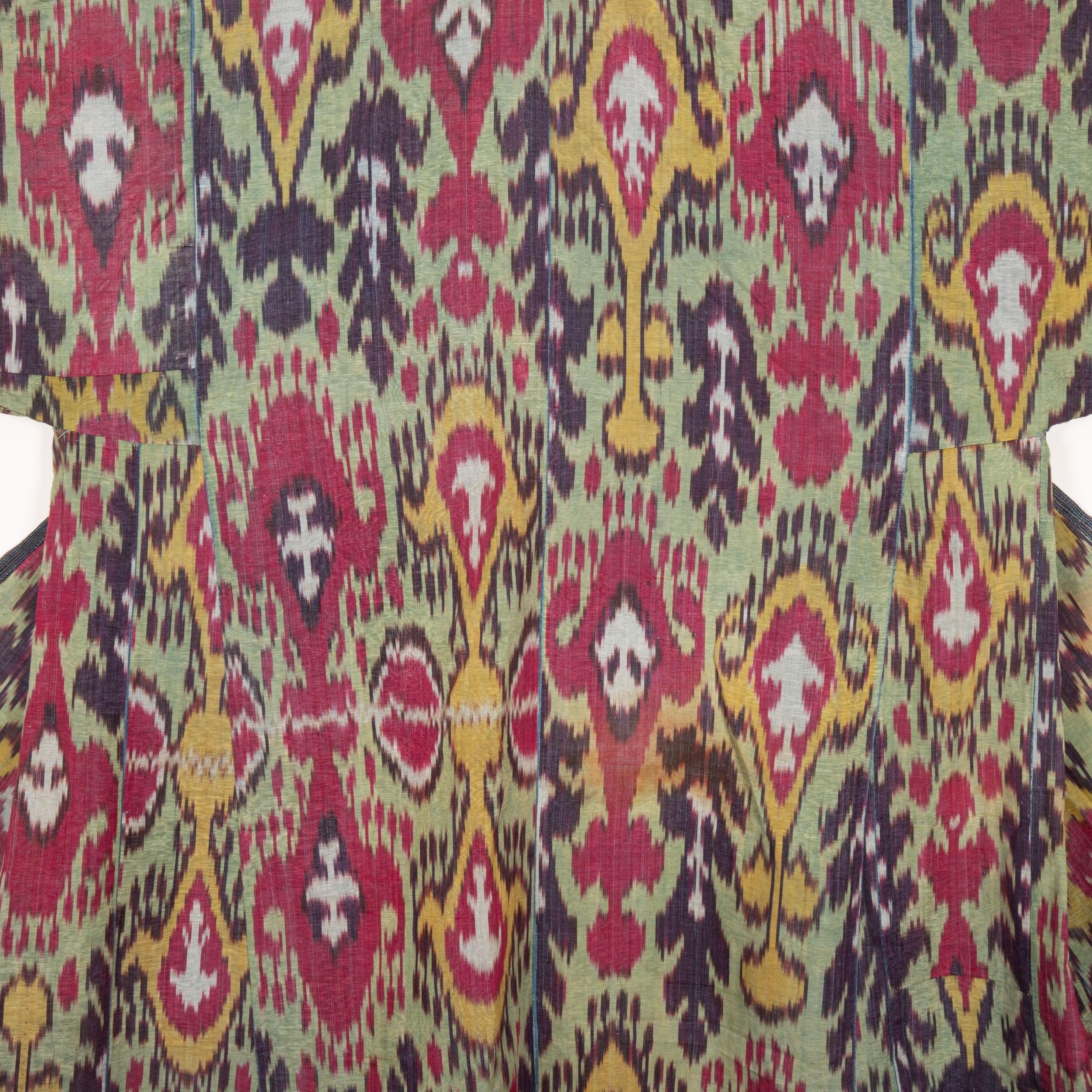 Uzbek Antique Ikat Chapan with a Good Mix of Roller Printed Lining, 19th Century