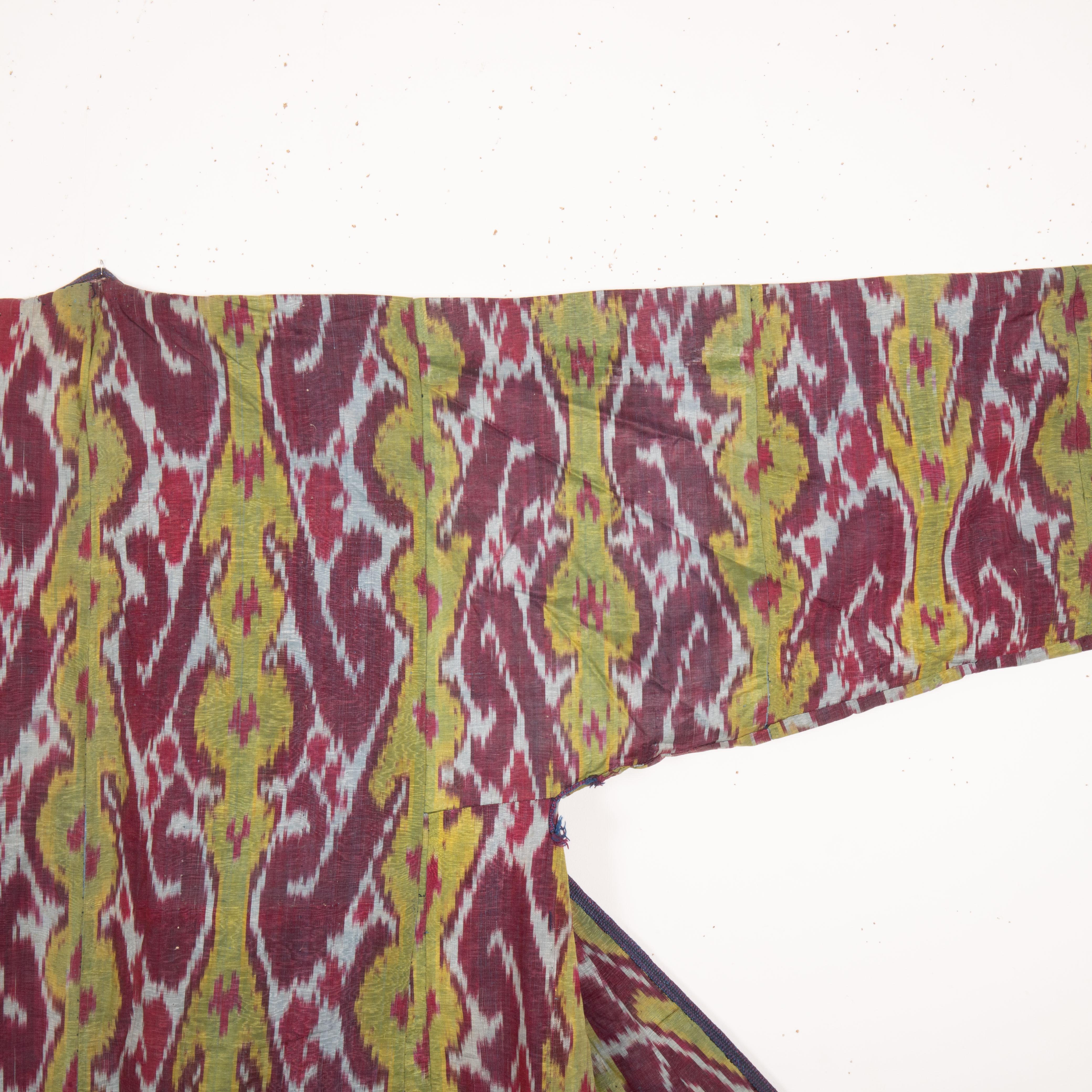 Uzbek Antique Ikat Chapan with a Good Mix of Roller Printed Lining, 19th Century For Sale