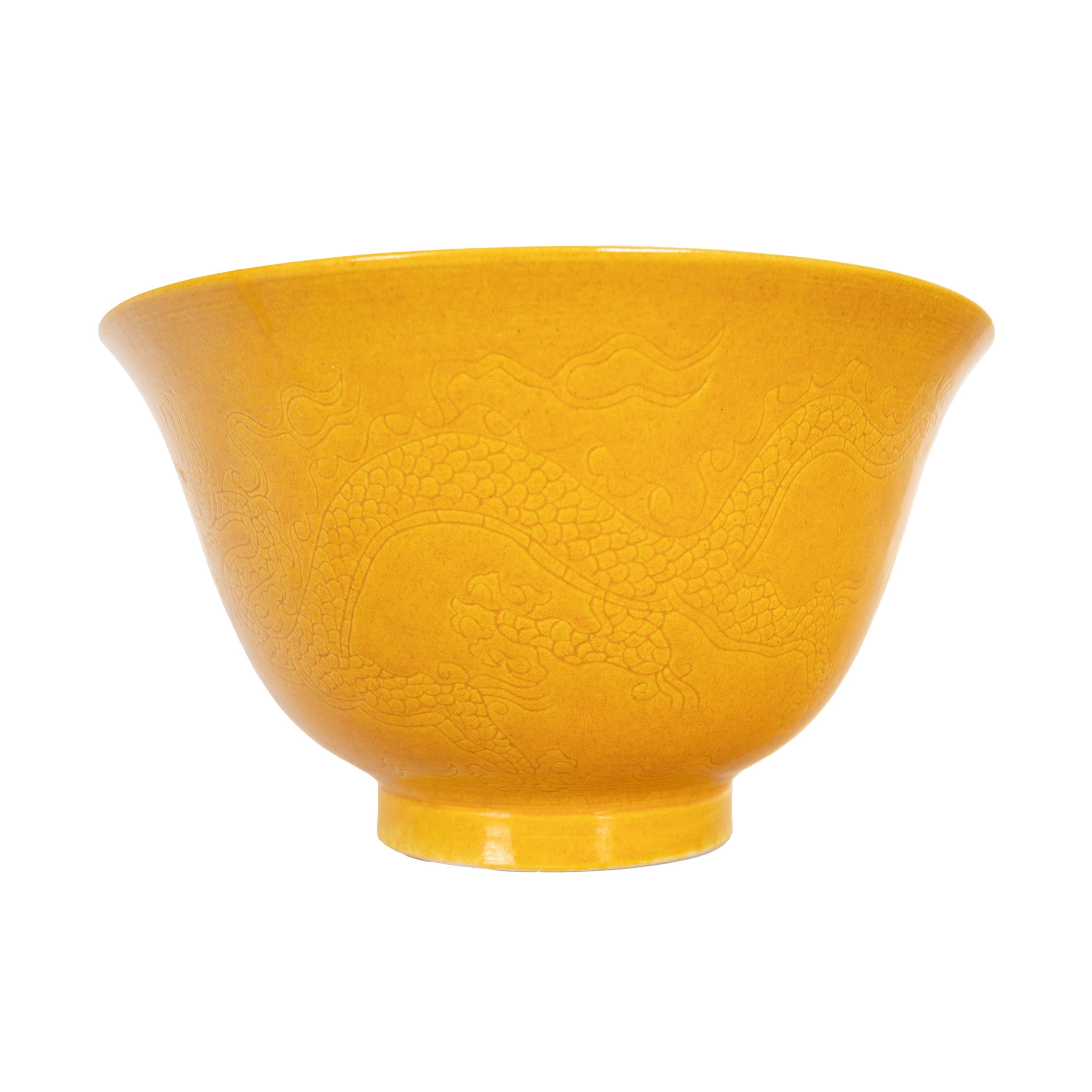 A good antique Imperial Chinese Qing dynasty, Guangxu period yellow glazed and incised decorated dragon bowl, mark & period, circa 1875.
The bowl covered with an 'egg yolk' yellow glaze & incised decoration to both the exterior & interior, around