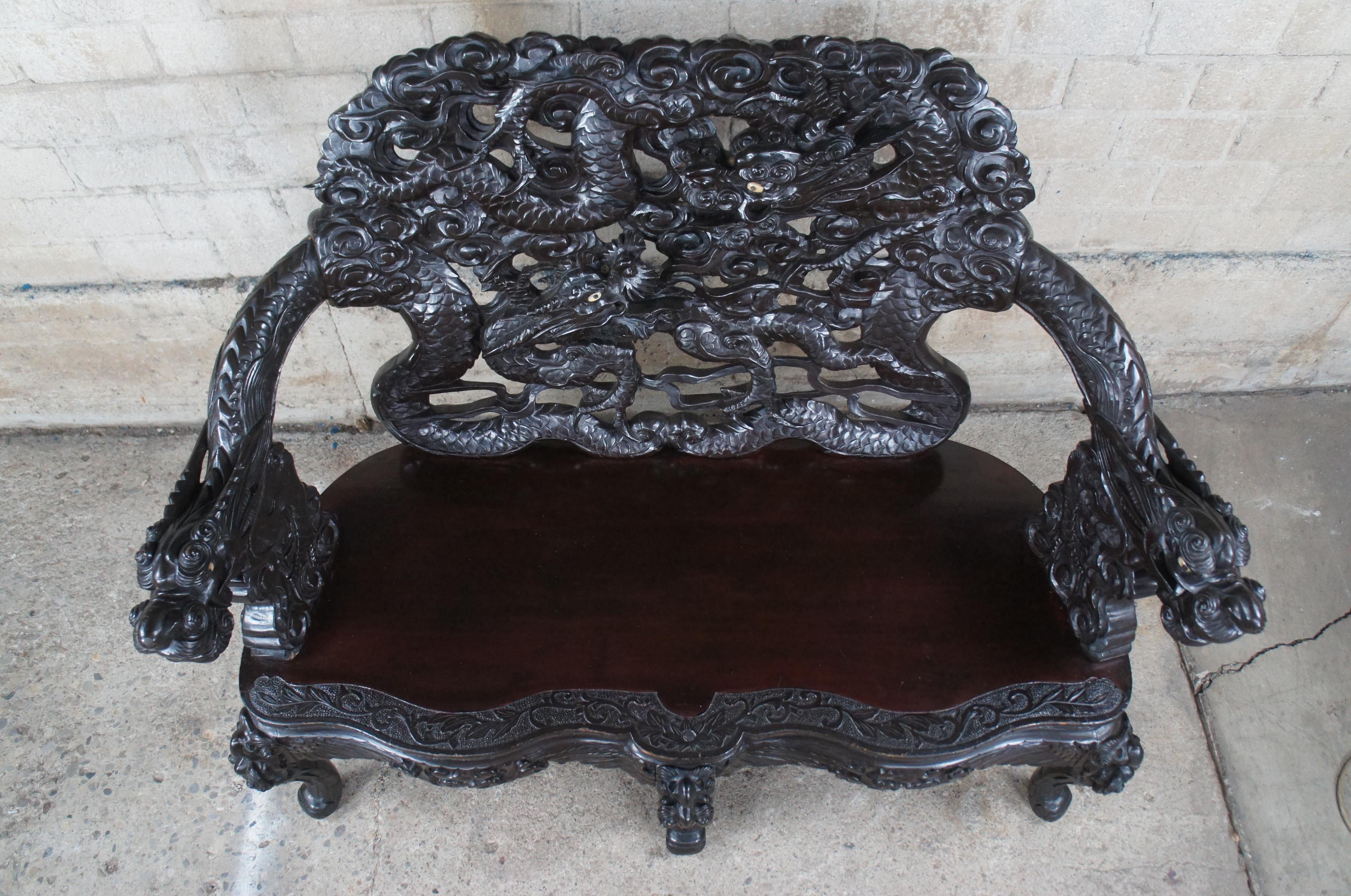 Antique Imperial Meiji Japanese Ebonized High Relief Carved Dragon Bench In Good Condition For Sale In Dayton, OH