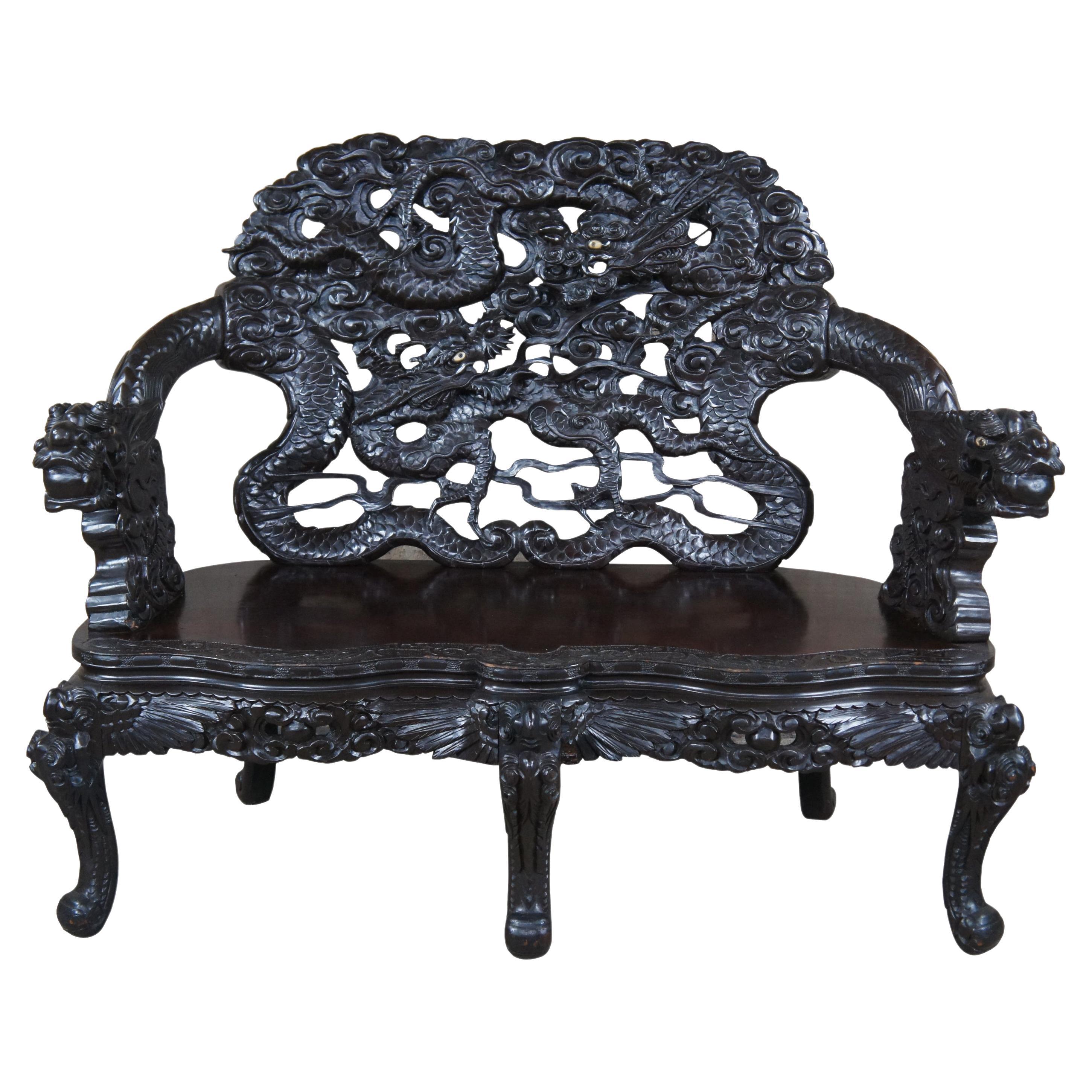 Antique Imperial Meiji Japanese Ebonized High Relief Carved Dragon Bench For Sale