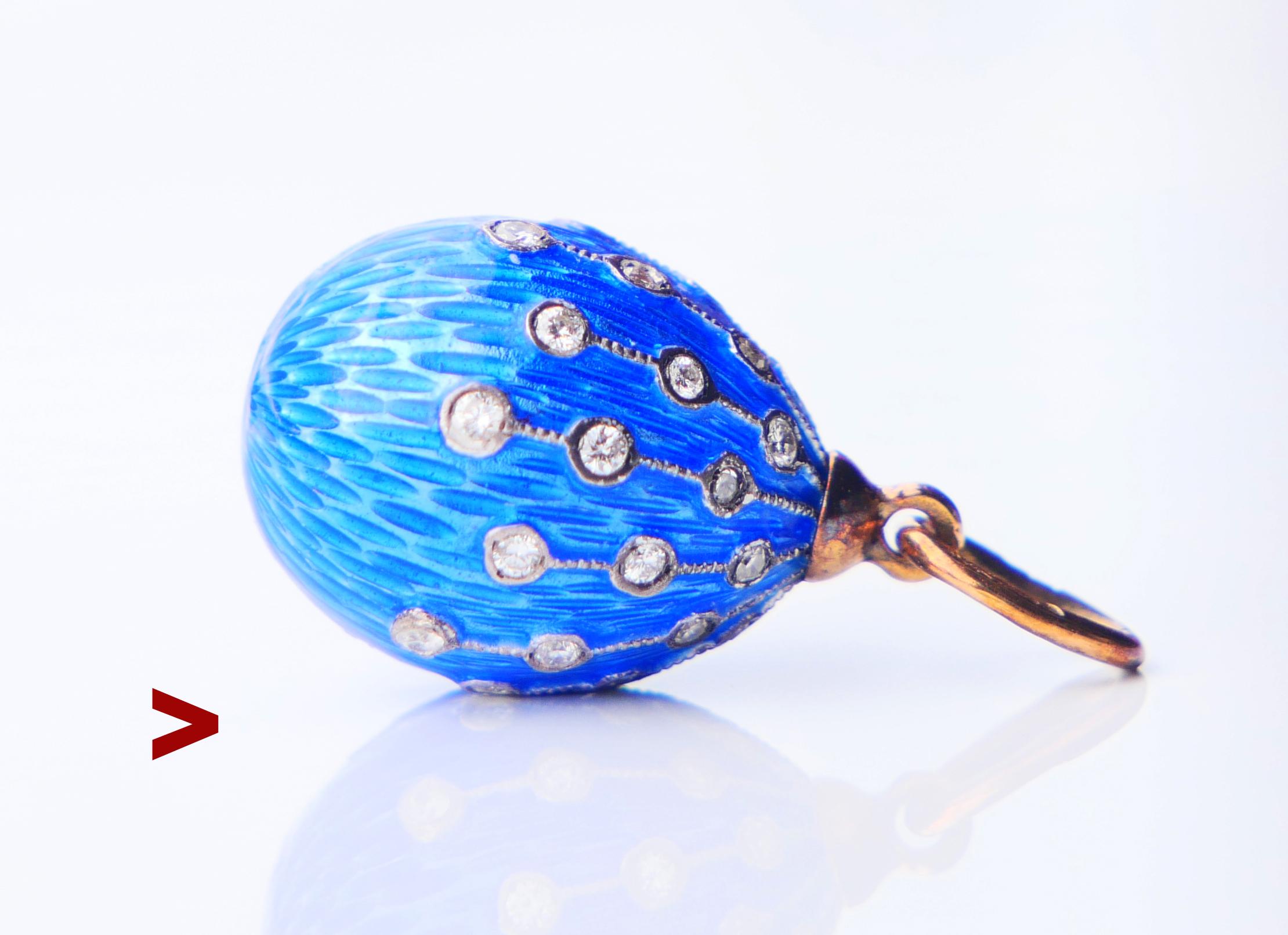 Antique miniature Passover Egg pendant made in Imperial Russia between the years 1884 - 1916.

Body in Silver finished with fine translucent Guilloche Cobalt Blue toned Enamel spread around 12 rays of silver clusters with 36 bezel set Russian
