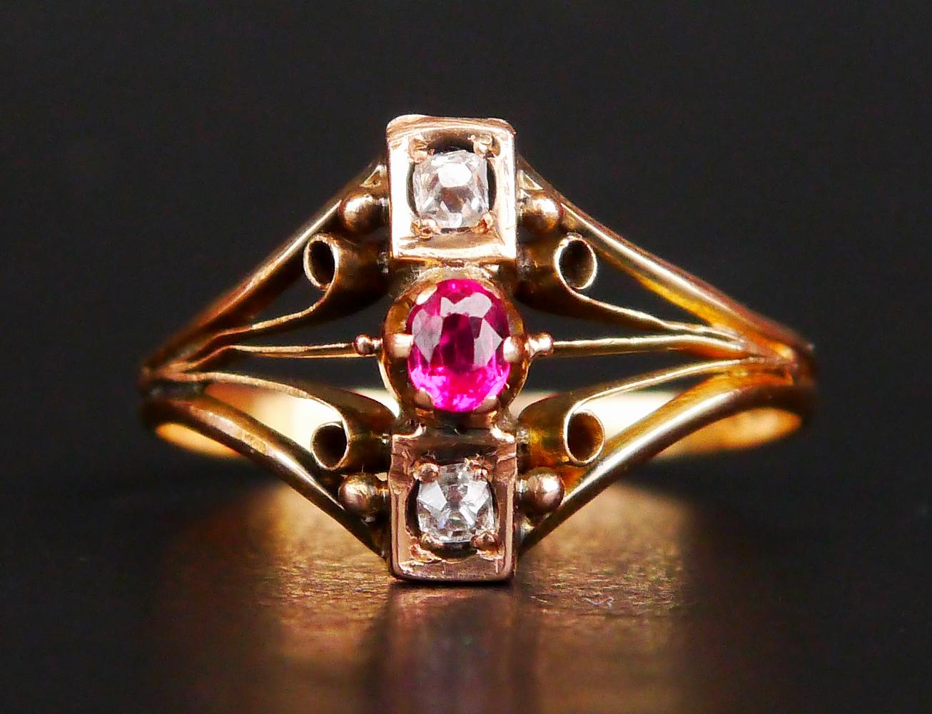 Russian Imperial period Ring with openwork shoulders featuring one claw set old oval cut Ruby and two bezel set old cushion cut Diamonds.

Made in Imperial Russia ca. late XIX - early XX cent. Hallmarked with Imperial Russian 56 hallmarks used