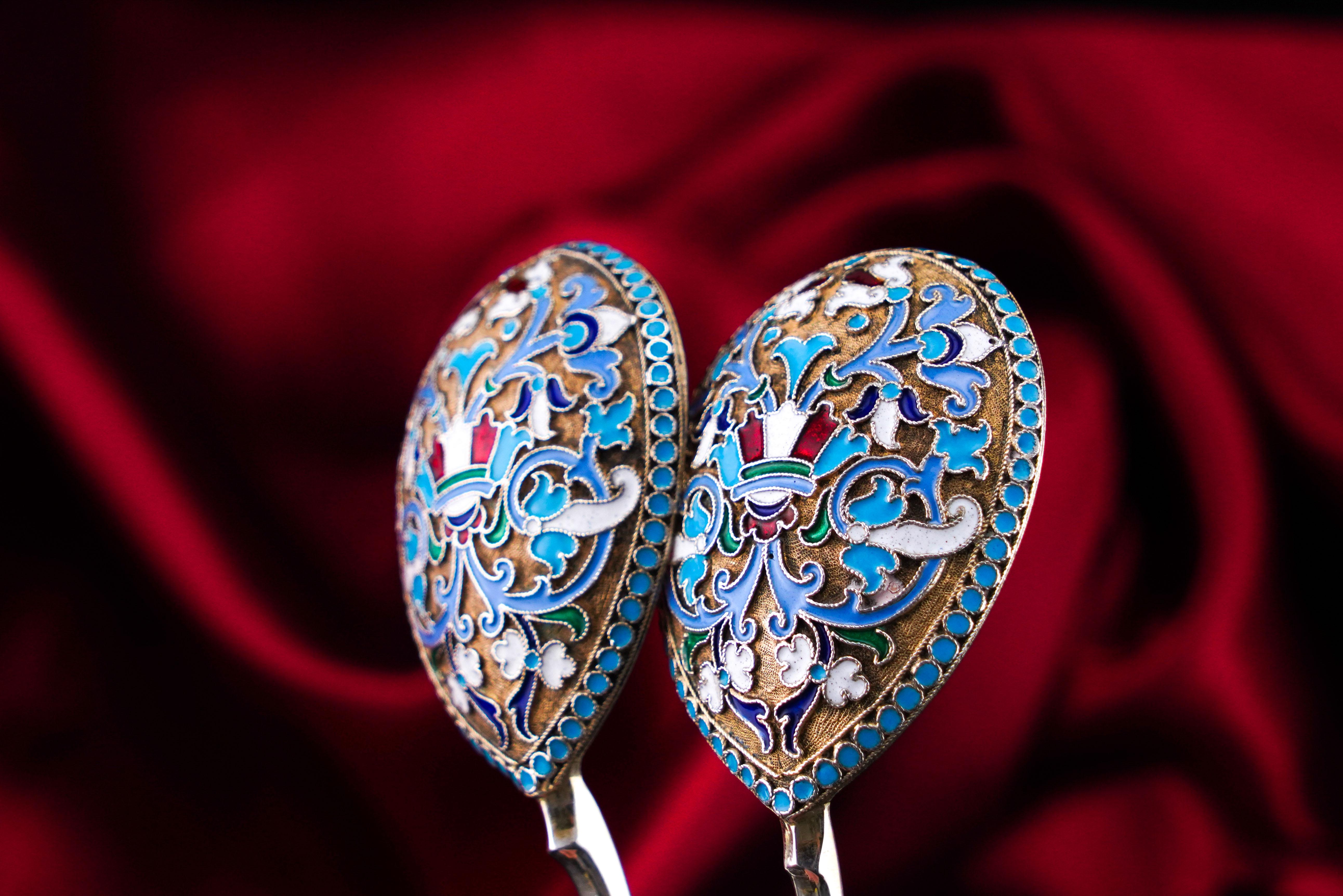 We are delighted to offer this beautiful pair of antique Imperial Russian solid silver enamel spoons made in Moscow c.1882-1899 with marks for Vasily Agafonov.

This pair is of a larger size than a normal pair of enamelled Russian spoons (larger