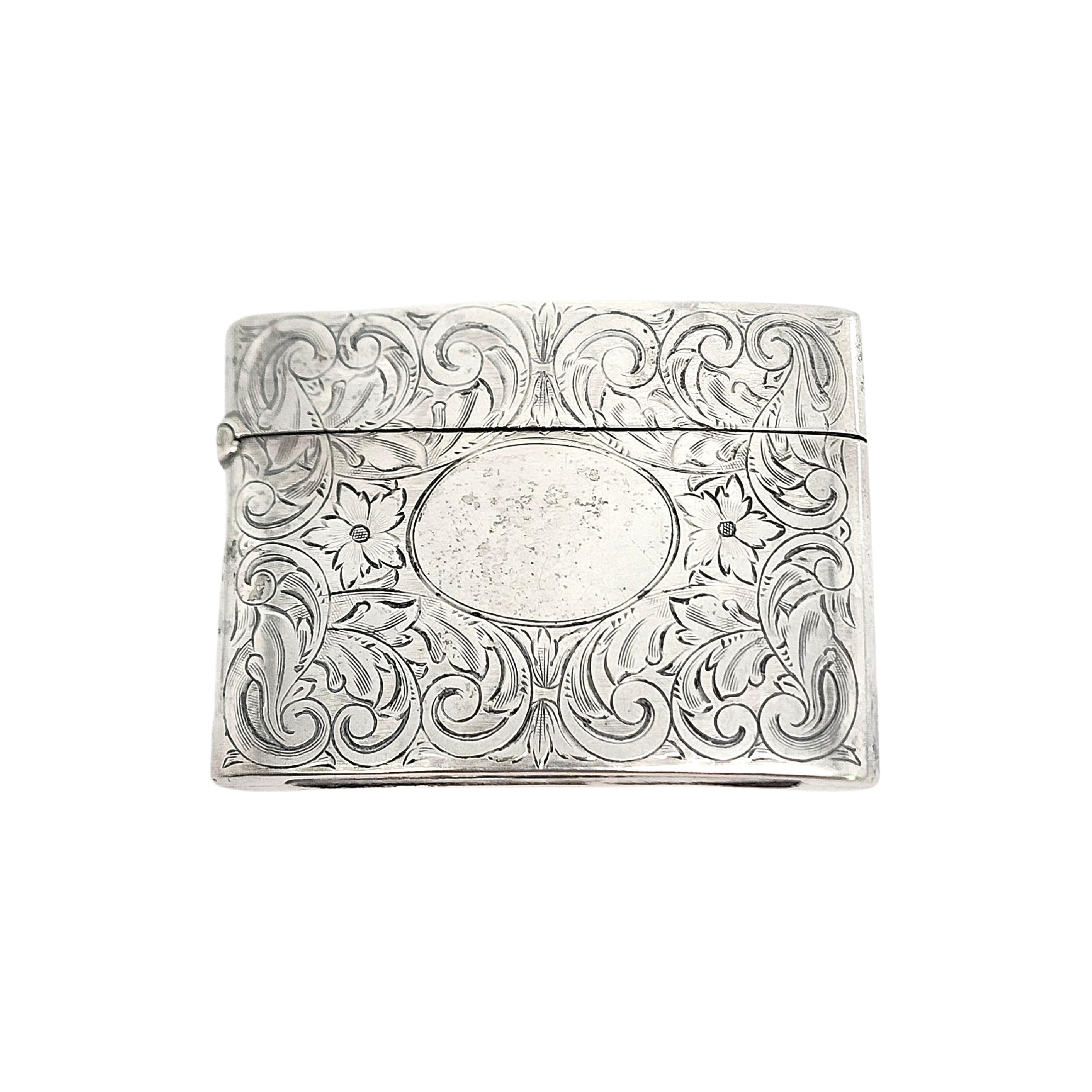 Sterling silver match safe/vesta case by IN Deitsch

No monogram

This beautiful piece by IN Deitsch of NY, NY (from 1904-1920) features an etched scroll design on one side with a blank oval cartouche, and is polished smooth on the other side. It