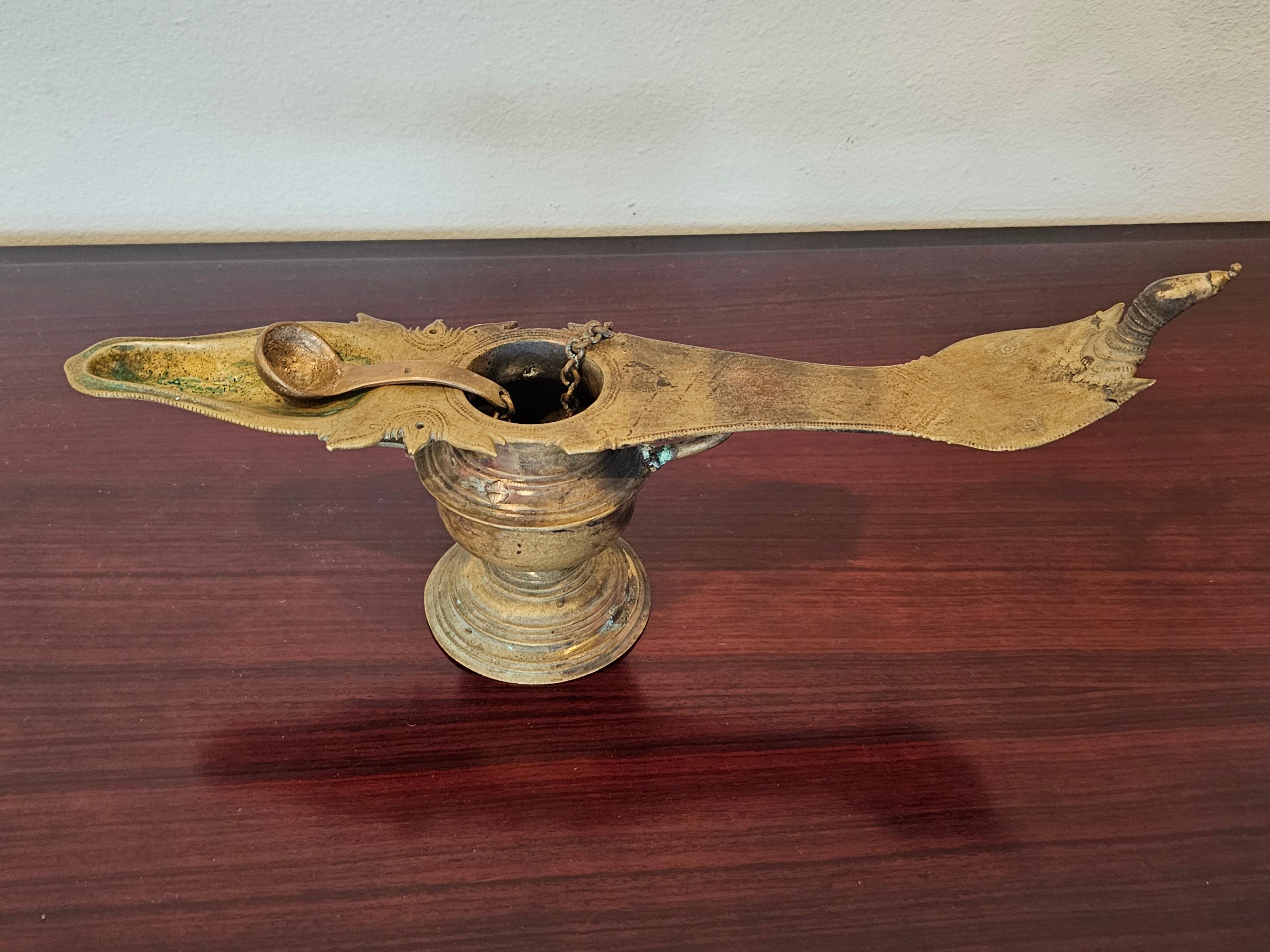 19th Century Antique India Patinated Brass Changalvetta Hindu Ritual Oil Lamp with Ladle For Sale
