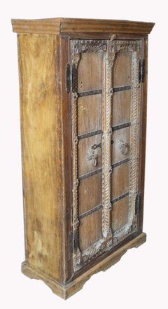Antique Indian 19th Century Armoire with Metal Braces and Hand-Carved Decor