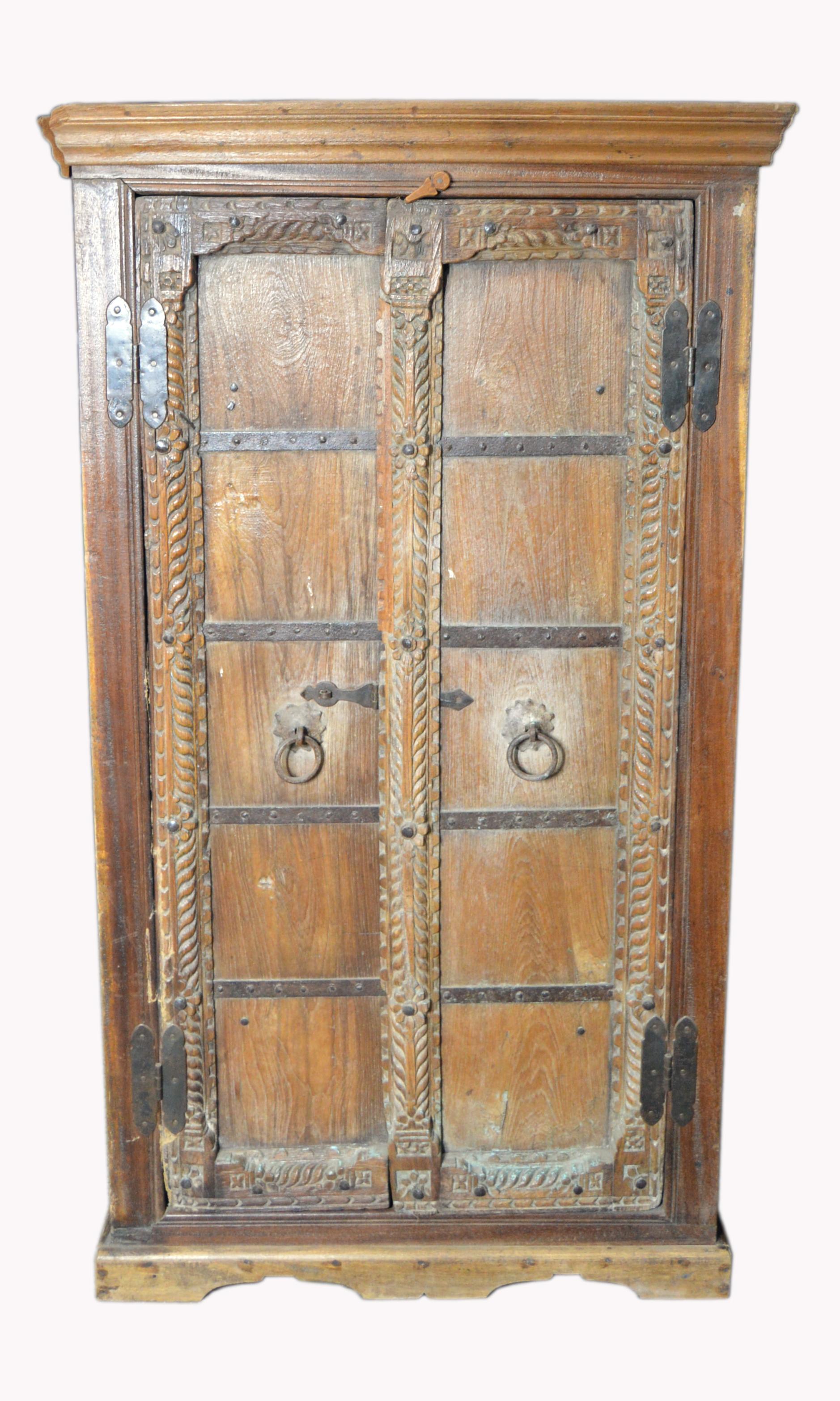Antique Indian 19th Century Armoire with Metal Braces and Hand-Carved Decor In Good Condition In Yonkers, NY