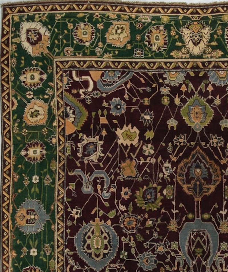 The deep reds so synonymous with Agra`s is used to such effect here, to create a rug with power and strength. The field filled with floral designs of so many different styles and colors, is so well offset by the deep green border, and gives this rug
