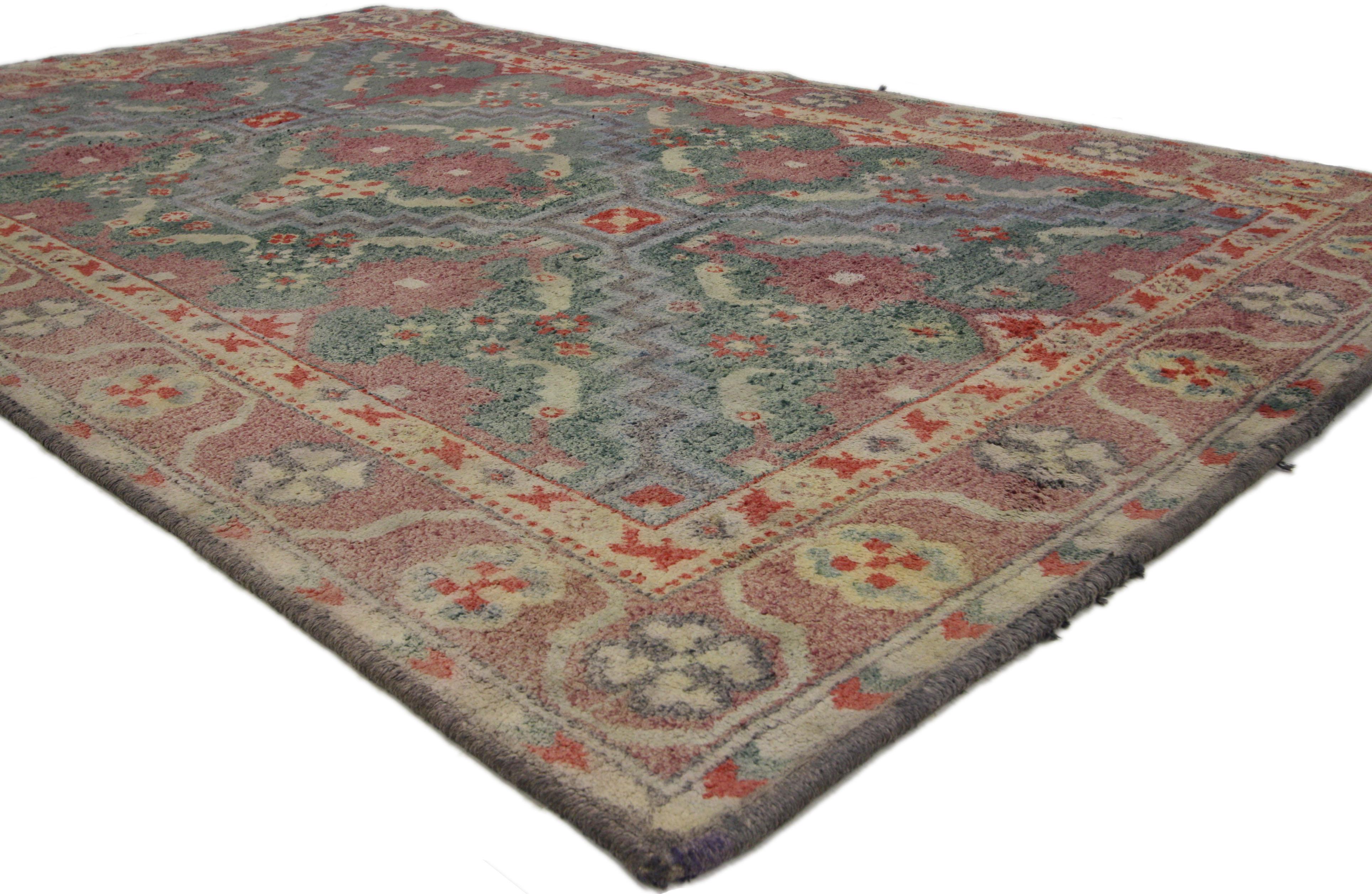 73302 Antique Indian Agra Accent Rug with English Country Cottage Style 04'06 x 07'04. This hand-knotted cotton antique Indian Agra rug features an all-over botanical pattern composed of stylized florals, rosettes, serrated leaves, and blooming