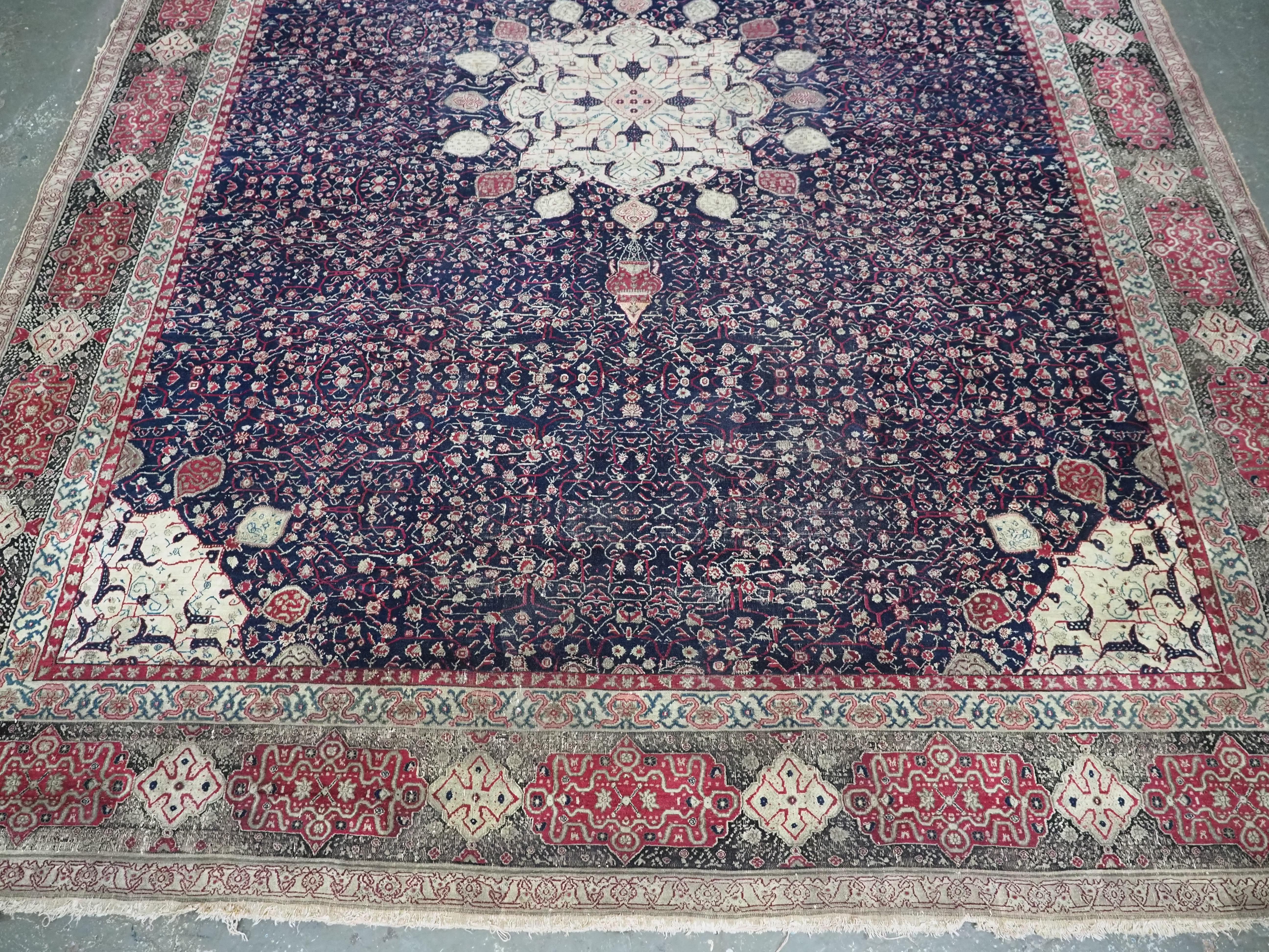 Wool Antique Indian Agra carpet of 'Ardabil' design.  Circa 1880. For Sale