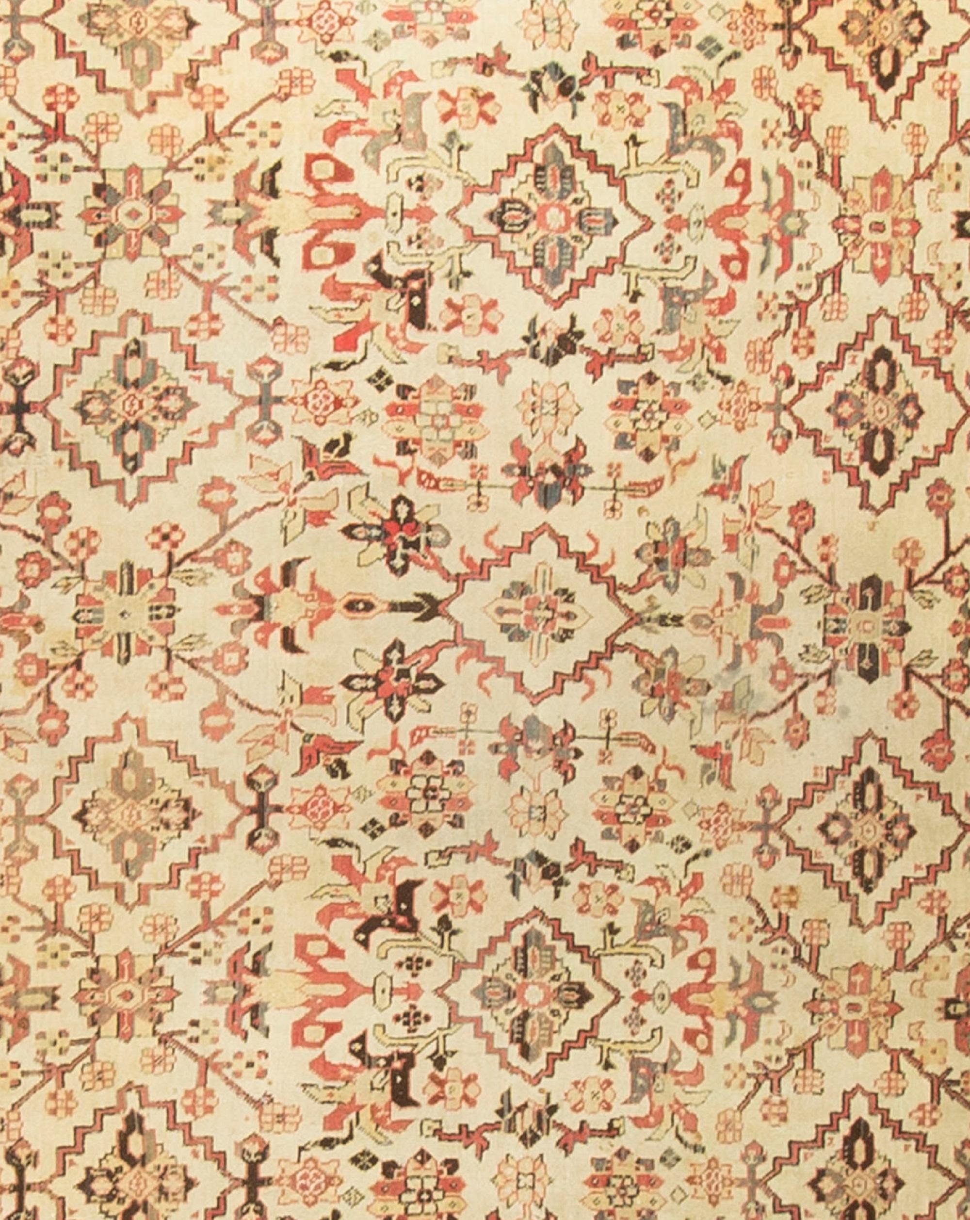 An antique Agra carpet fragment, being the main field, the main border has been removed. The rug has a low pile that adds the patina so special in antique pieces.
 