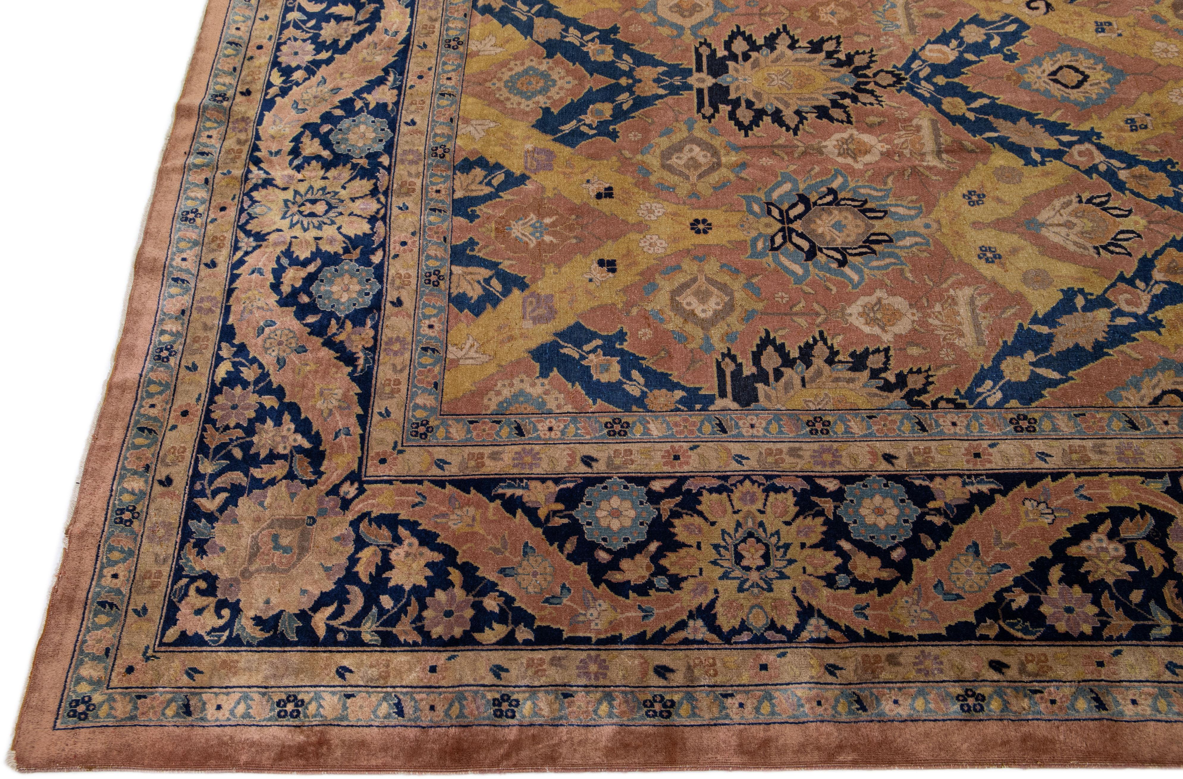 Hand-Knotted Antique Indian Agra Handmade Allover Pattern Peach Wool Rug For Sale