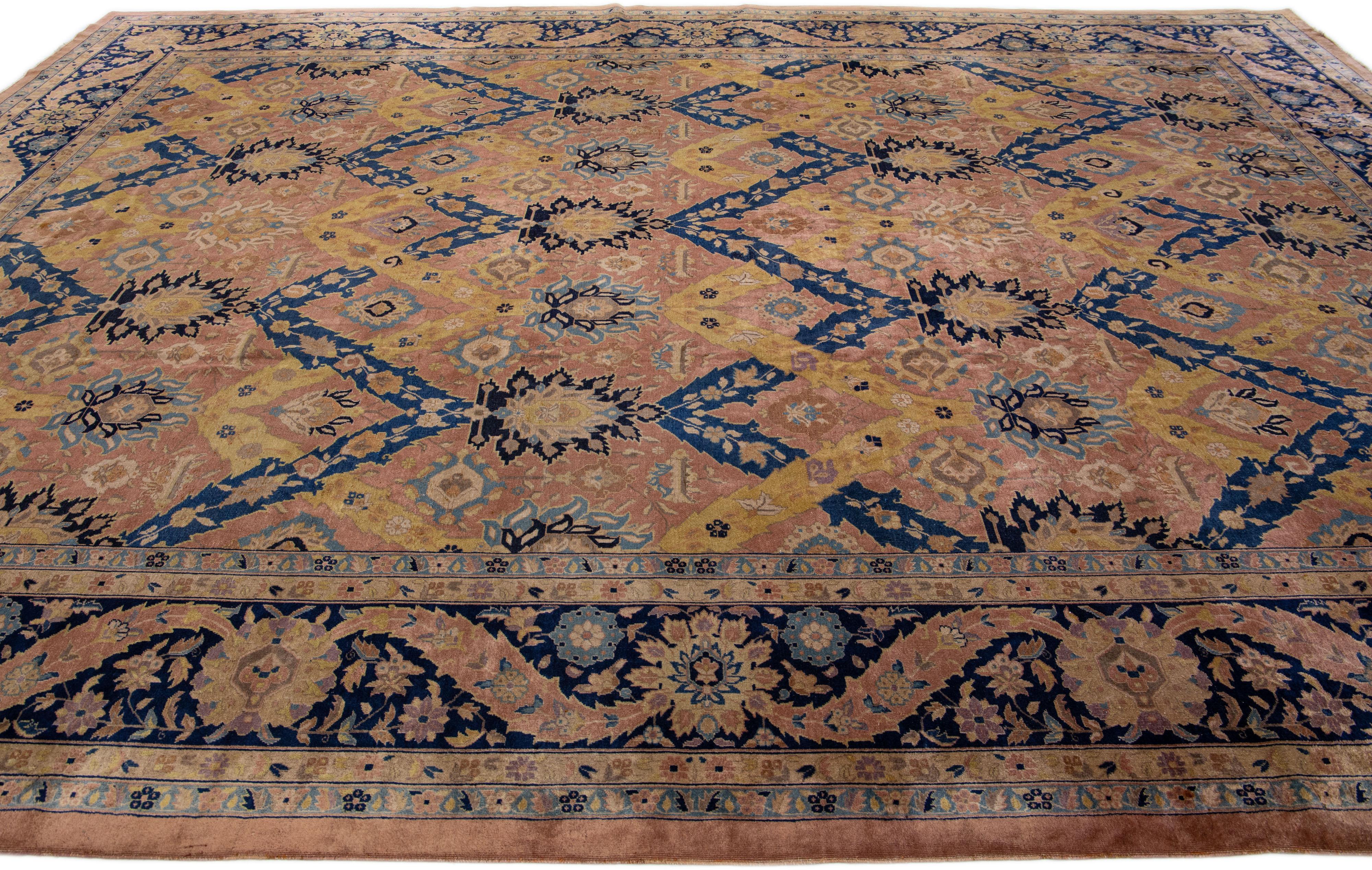 20th Century Antique Indian Agra Handmade Allover Pattern Peach Wool Rug For Sale
