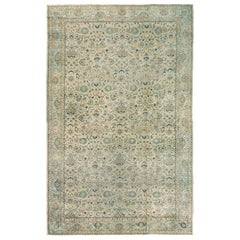 Tapis indien antique d
Agra à motif universel