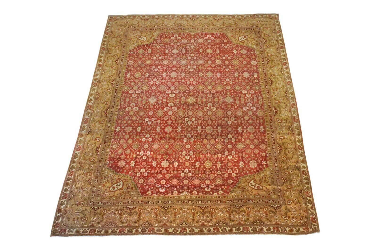 Hand-Knotted wool pile on a cotton foundation.

Circa 1900

Dimensions: 12' x 14'

Excellent for its age

Origin: India

Field Color: Red

Border Color: Light-Brown

Accent Colors: Light-Green, Plum, Burgundy, Hunter-Green, Light-Brown, Dusty-Rose