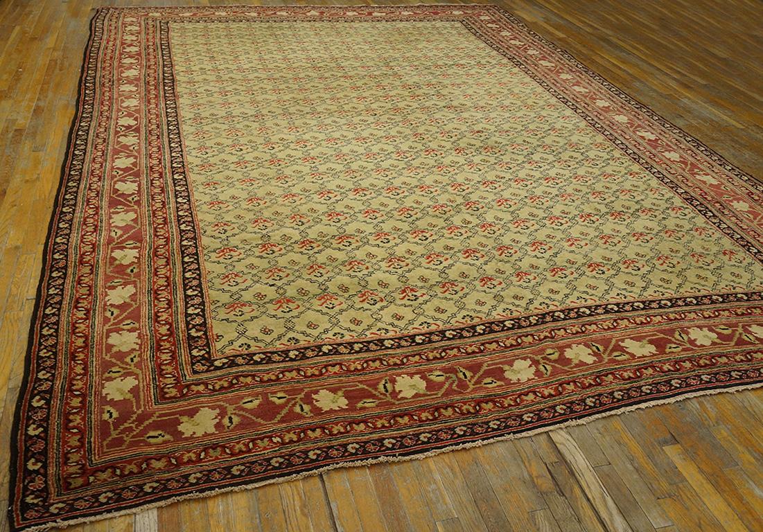 The cream field displays a small, interlocking curvy lattice in a vaguely Caucasian style, all enclosed in a five stripe border system with a central red main stripe with an angular meander sprouting simple profile flowers. Antique carpet, good