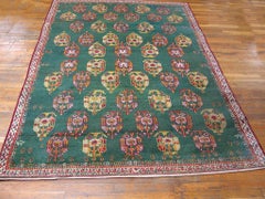 Amazing Antique Indian Agra Rug a Green Background with a Beige Border.