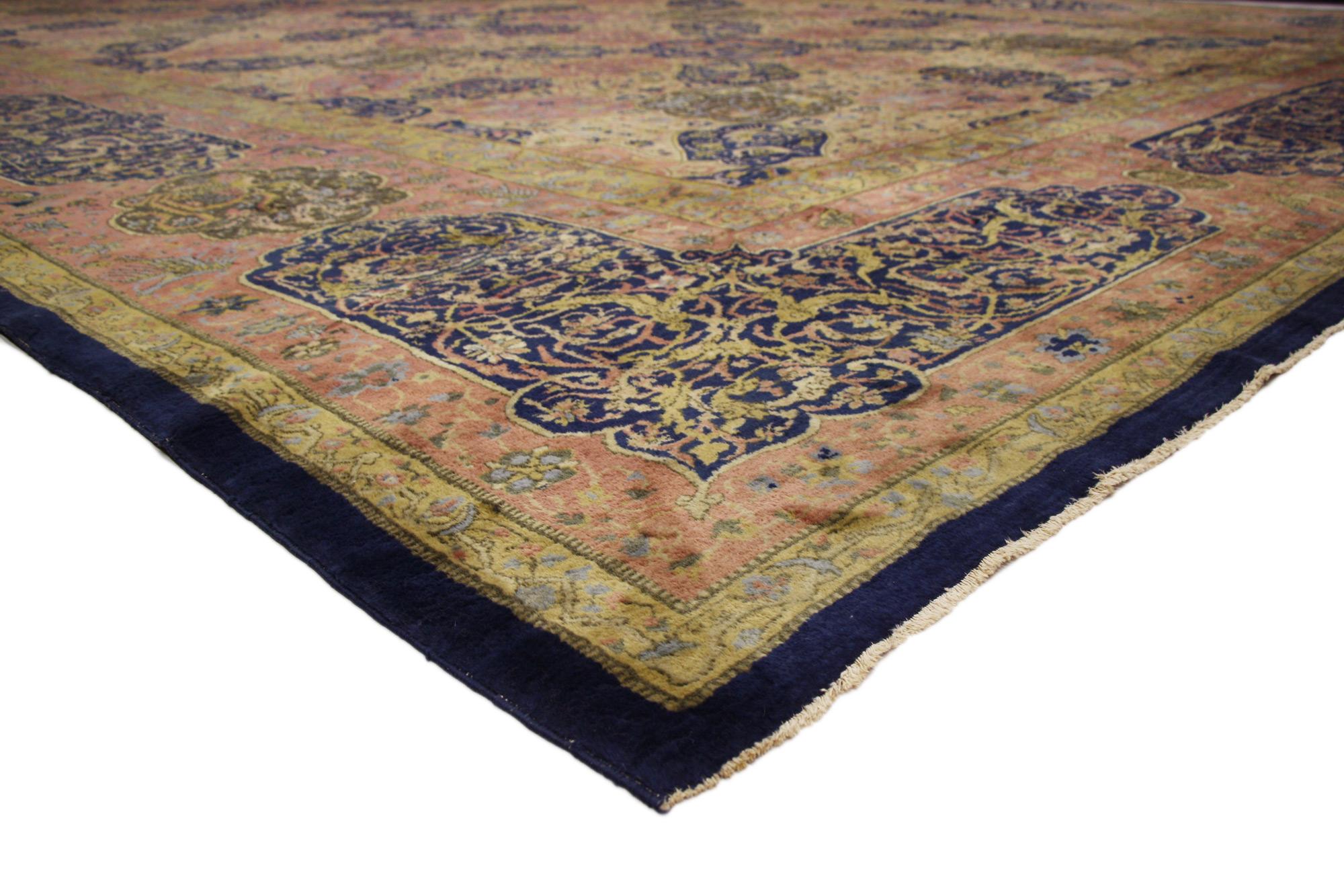 77150 Antique Indian Agra Rug 15'02 x 24'04. Reflecting Persian carpet elements from the 16th century, this hand-knotted wool antique Indian Agra rug is a captivating vision of woven beauty. The eye-catching Dragon and Phoenix design and refined