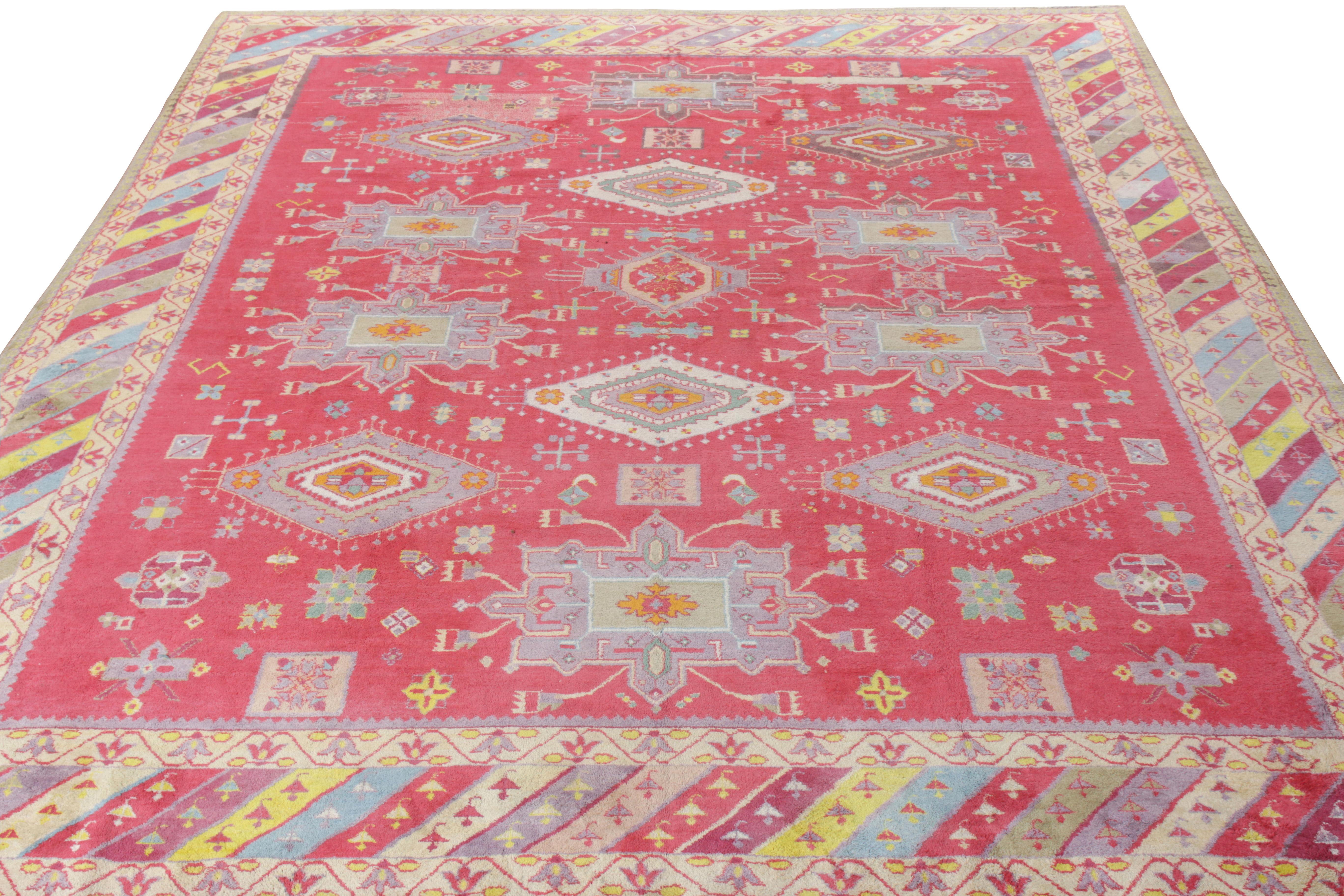 Hand knotted in soft, yet durable cotton, an antique Agra rug from the 1920s originating from India—now joining Rug & Kilim’s Antique & Vintage collection. Bearing an all over geometric-floral pattern in medallion style, the rug embraces a vibrant