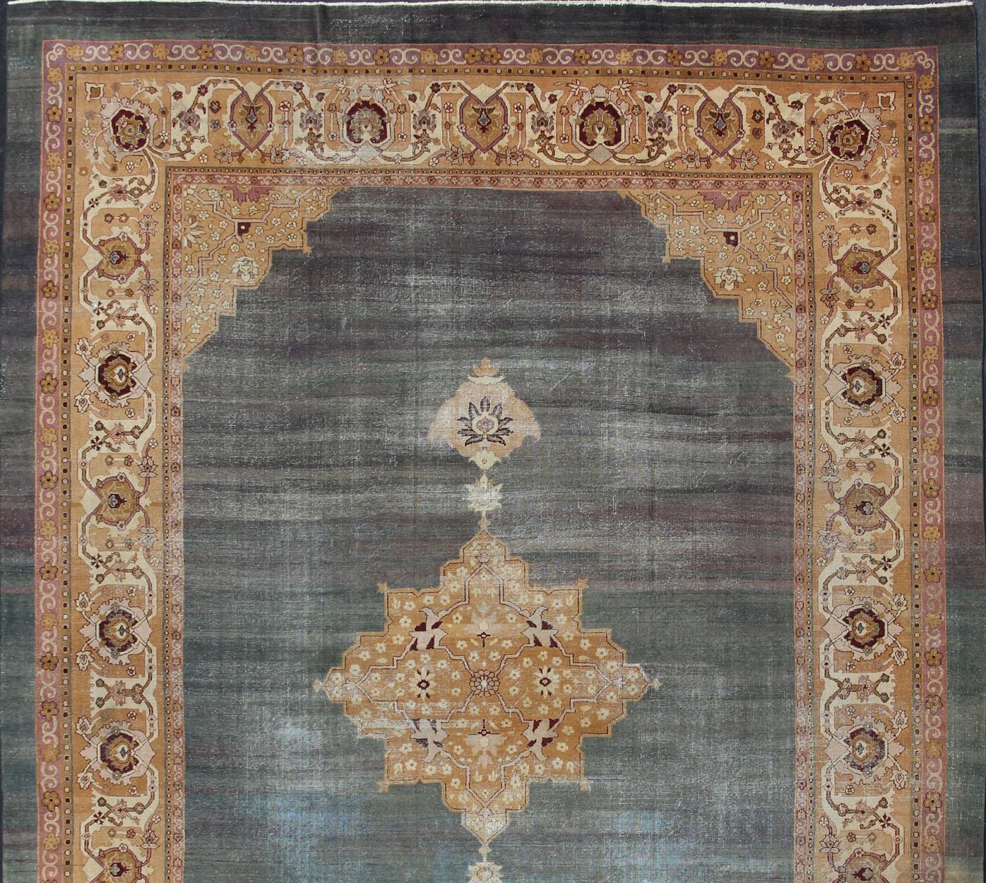 Antique Indian Agra rug intoxicating blue field and crown jewel medallion, antique crown jewel medallion, kwarugs / Keivan Woven Arts  / E-0907 /  country of origin / type: Iran / Agra, circa 1900 Antique Agra, antique Amritsar.
Measures: 12'11 x