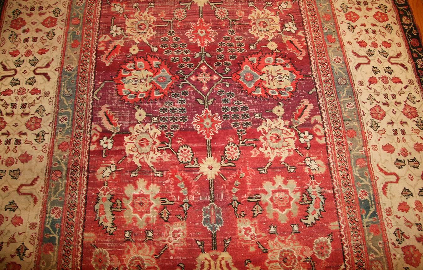 Beautiful Antique Indian Agra Rug. Country of Origin/ Rug Type: Indian Rug. Circa Date: 1900 – Size: 6 ft x 8 ft 9 in (1.83 m x 2.67 m)

Through the use of a brilliant rose-themed palette, this exquisite antique Indian Agra rug tantalizes the
