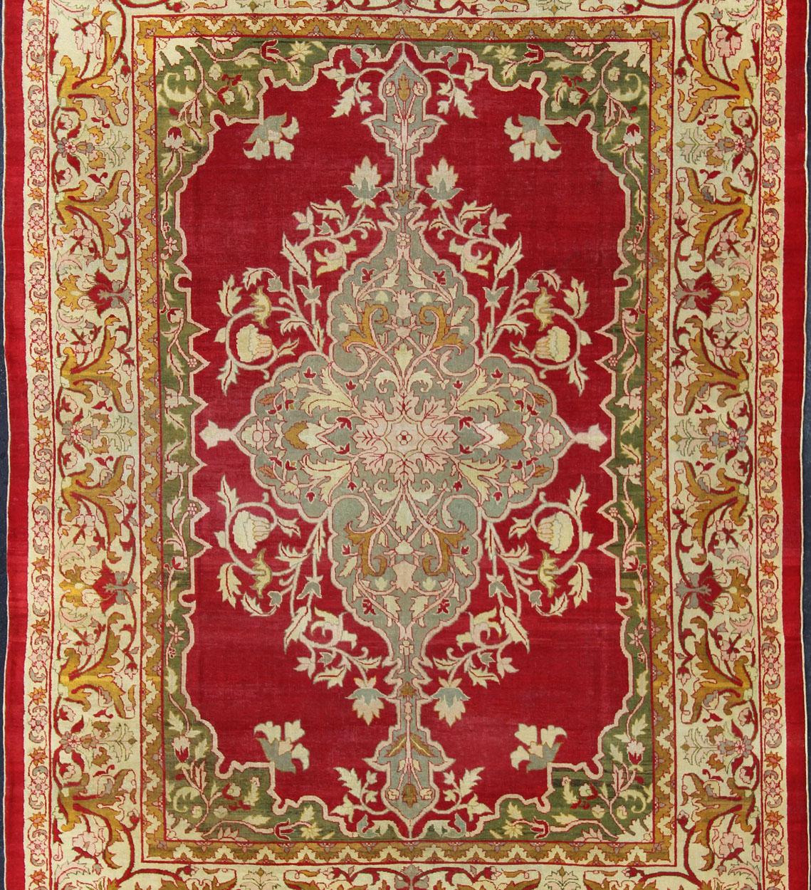 Hand-Knotted Indian Agra Antique Rug with Center Medallion in Green, Red, and Gold Colors For Sale
