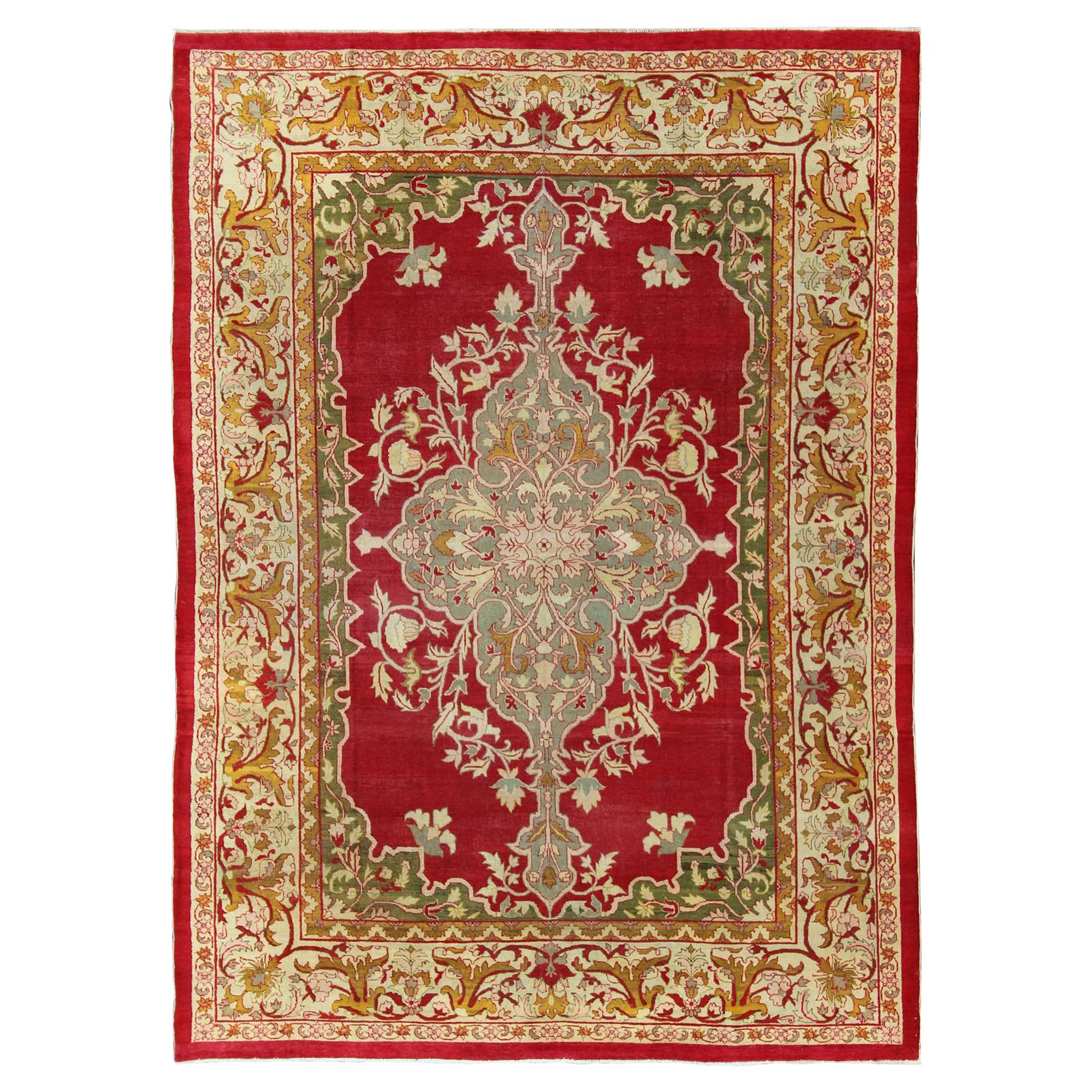 Indian Agra Antique Rug with Center Medallion in Green, Red, and Gold Colors For Sale