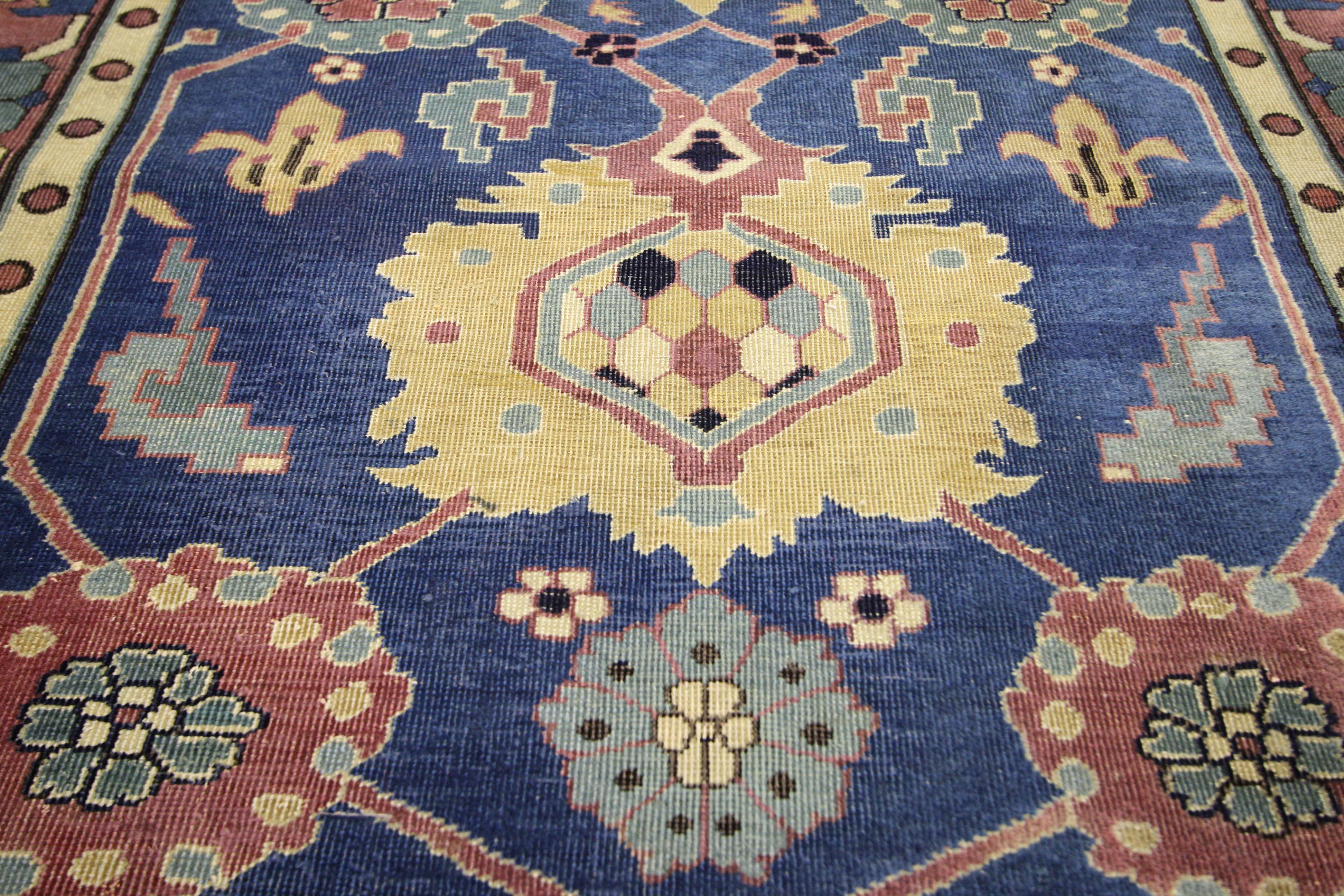 72374 Antique Indian Agra Runner in Blue with Modern Design. This beautiful antique Indian Agra runner features a multiple medallion design along the center and an allover intertwining botanical scene meandering throughout the blue field. With its