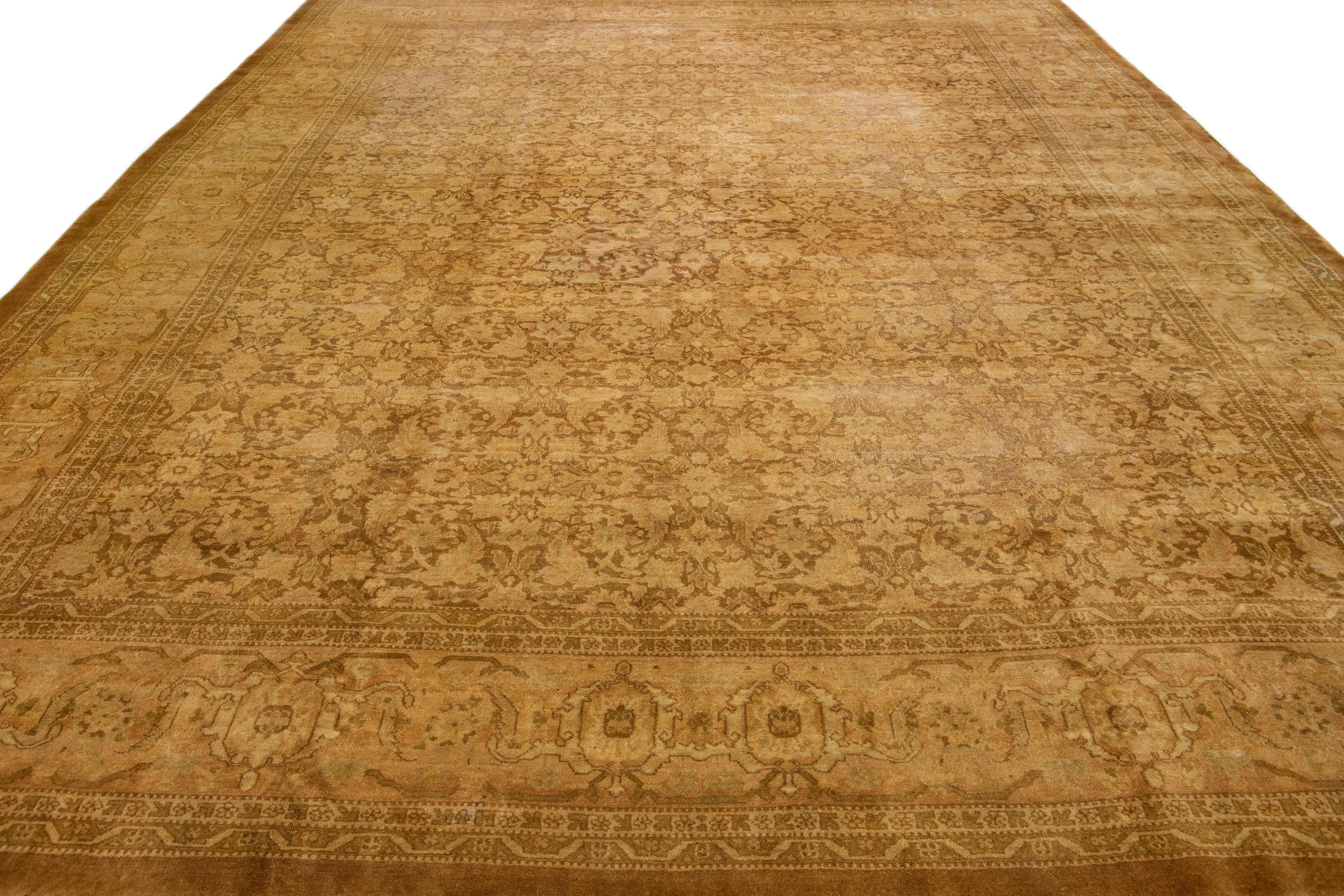 Anglo-Indian Antique Indian Agra Tan Handmade Wool Rug with Allover Design For Sale