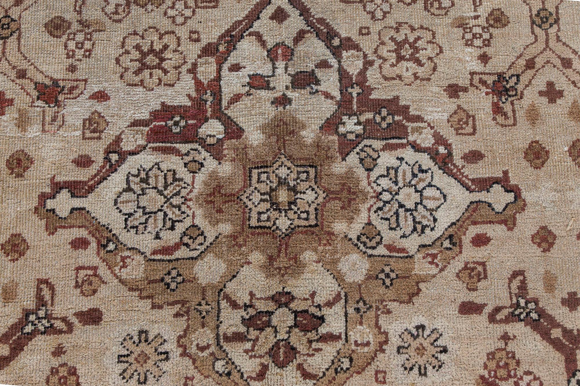 Antique Indian Amritsar beige, brown handmade wool carpet
Size: 8'9