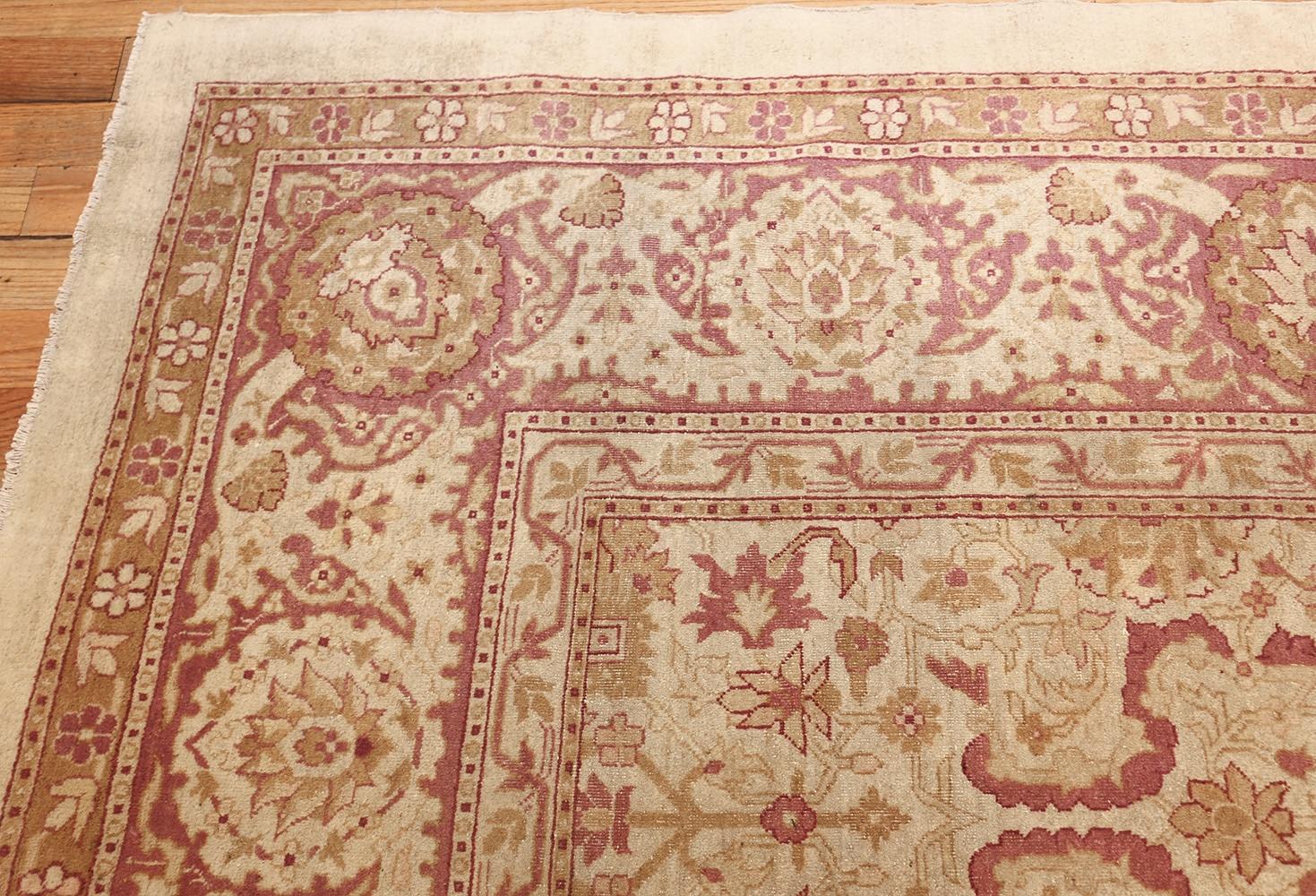 Antique Amritsar rug, origin: India, circa: Turn of the century. Size: 11 ft x 17 ft 6 in (3.35 m x 5.33 m)

Featuring an appealing pallet of ivories and purples, this elegant antique Indian Amritsar carpet is characterized by a meticulously woven