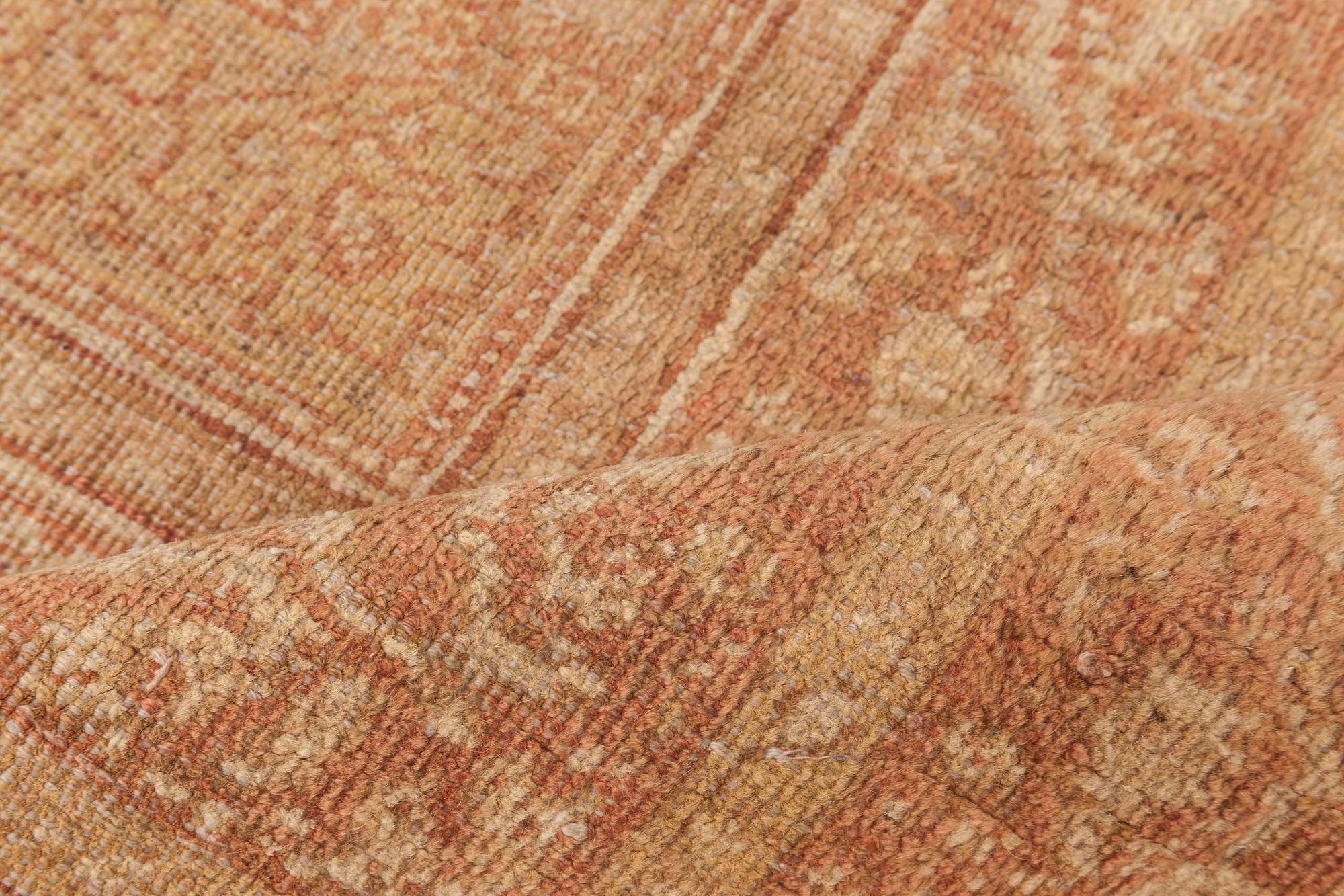 Antique Indian Amritsar brown handmade wool rug.
Size: 13'4